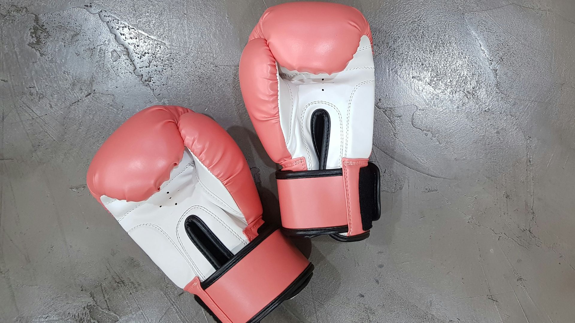 pair of pink boxing gloves