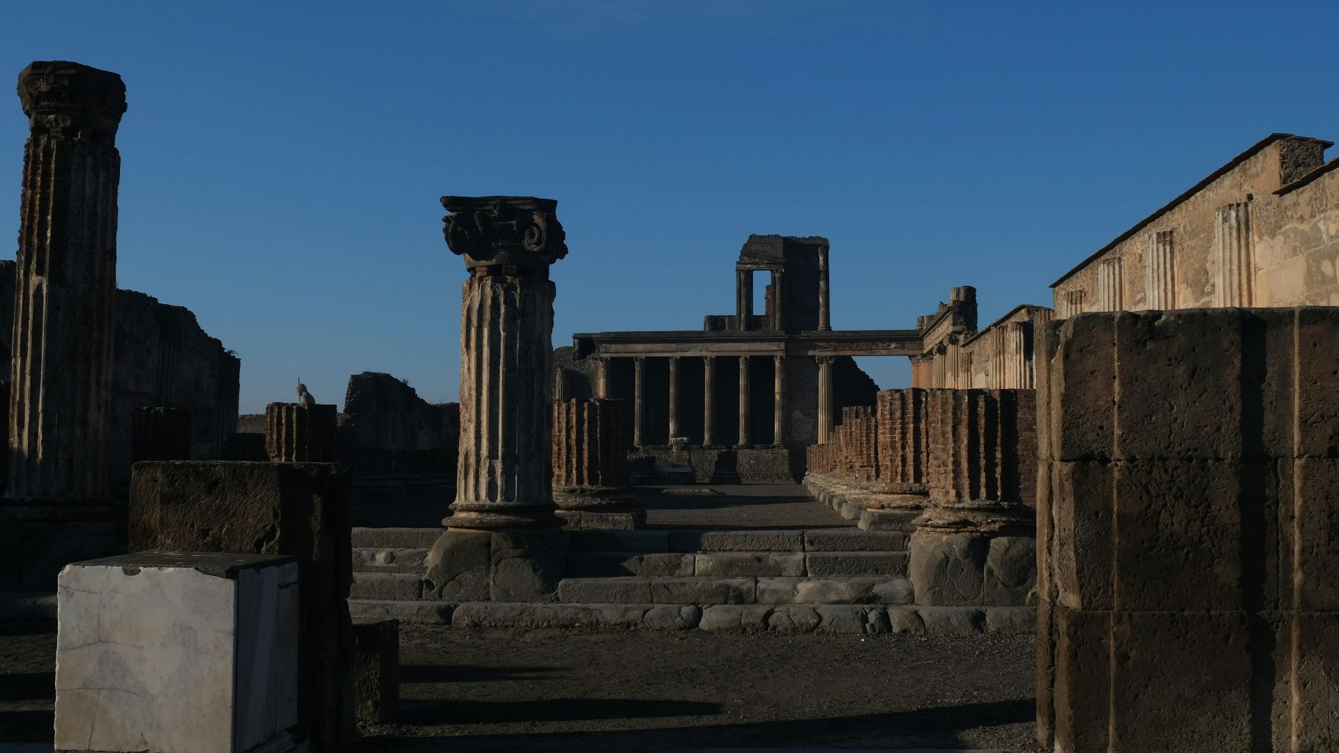 a stone building with pillars