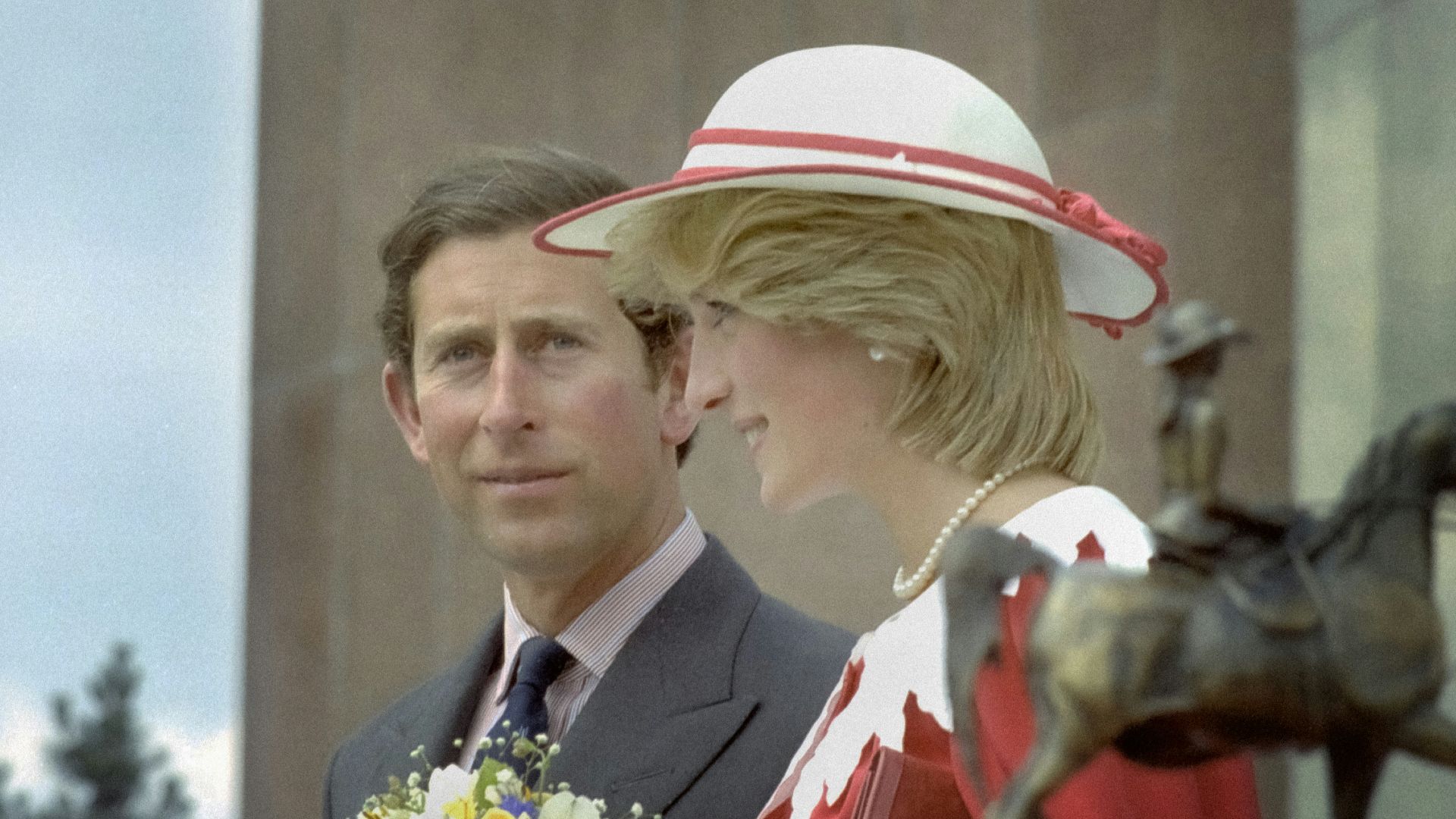 a man and a woman standing next to each other