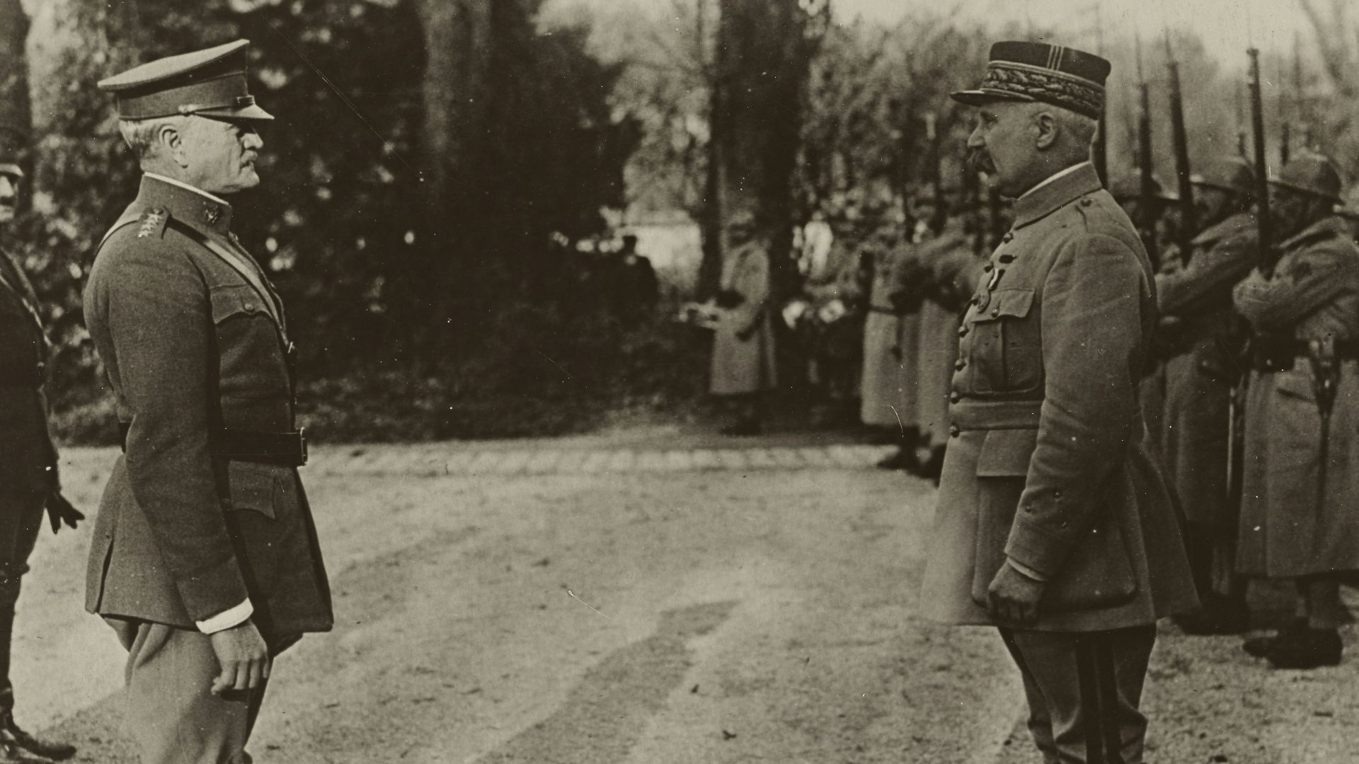 grayscale photo of 2 men in military uniform