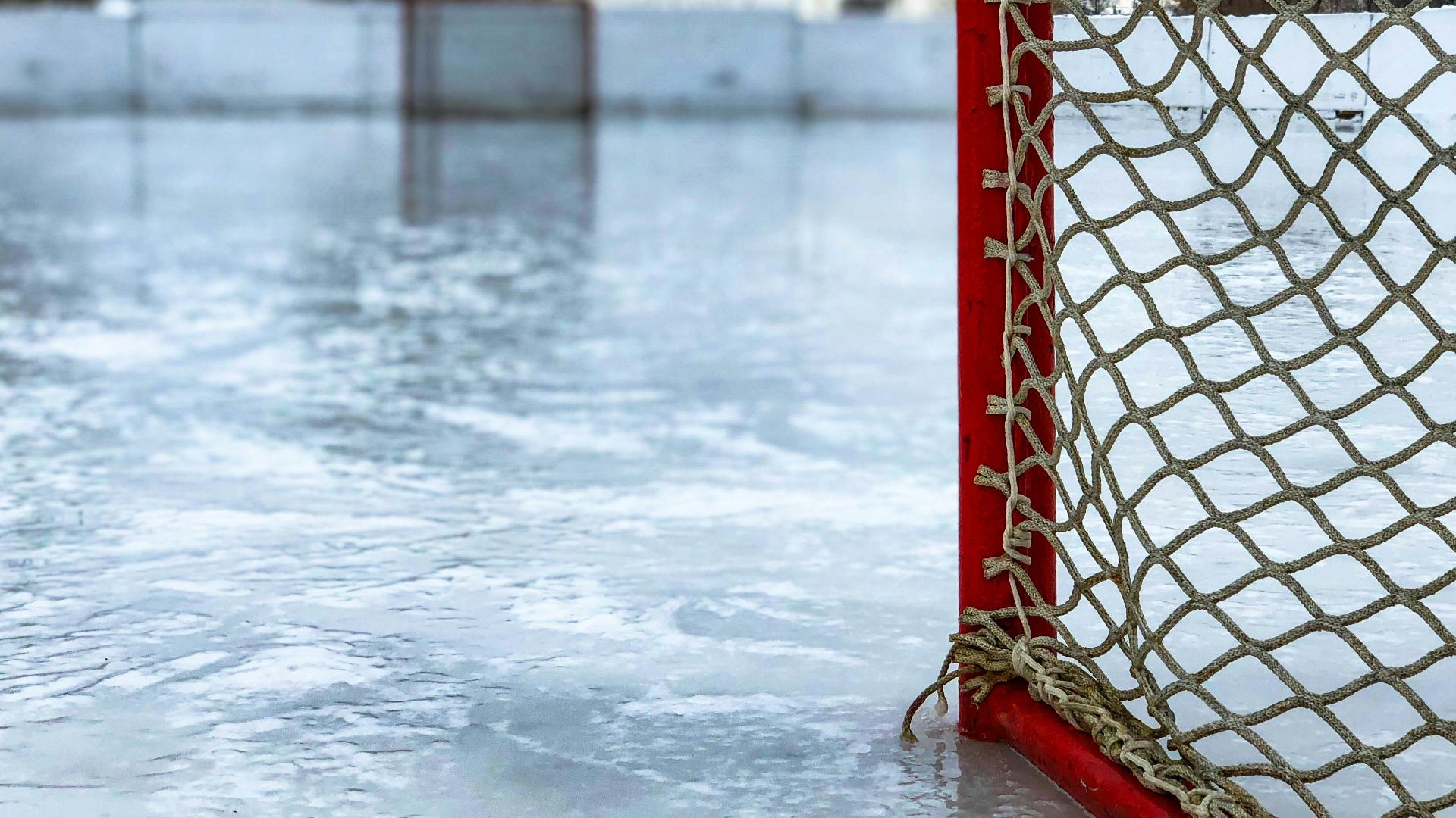 red and white hockey goal