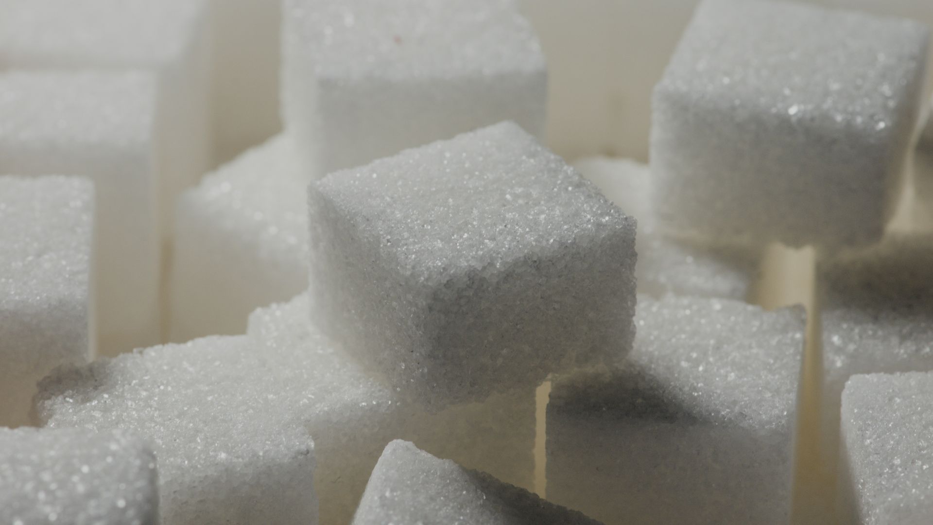 a pile of sugar cubes sitting on top of each other