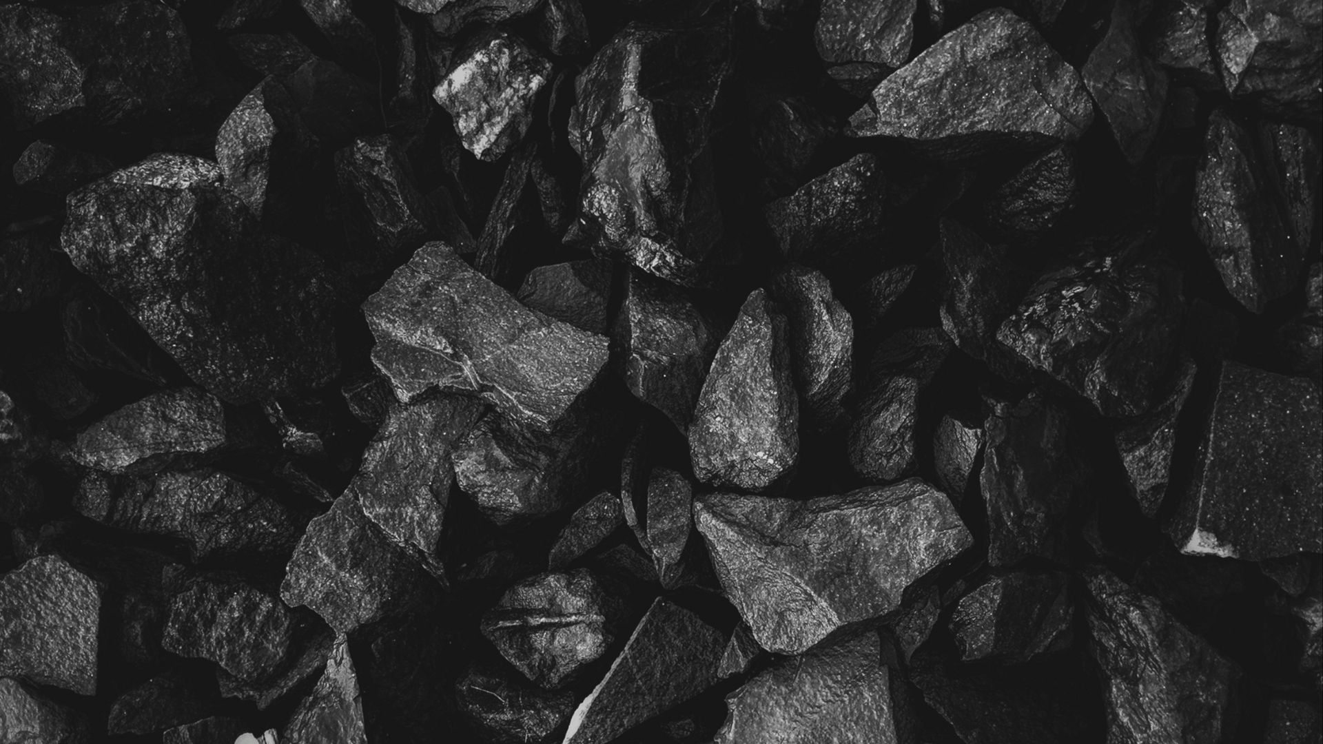 grayscale photo of stone