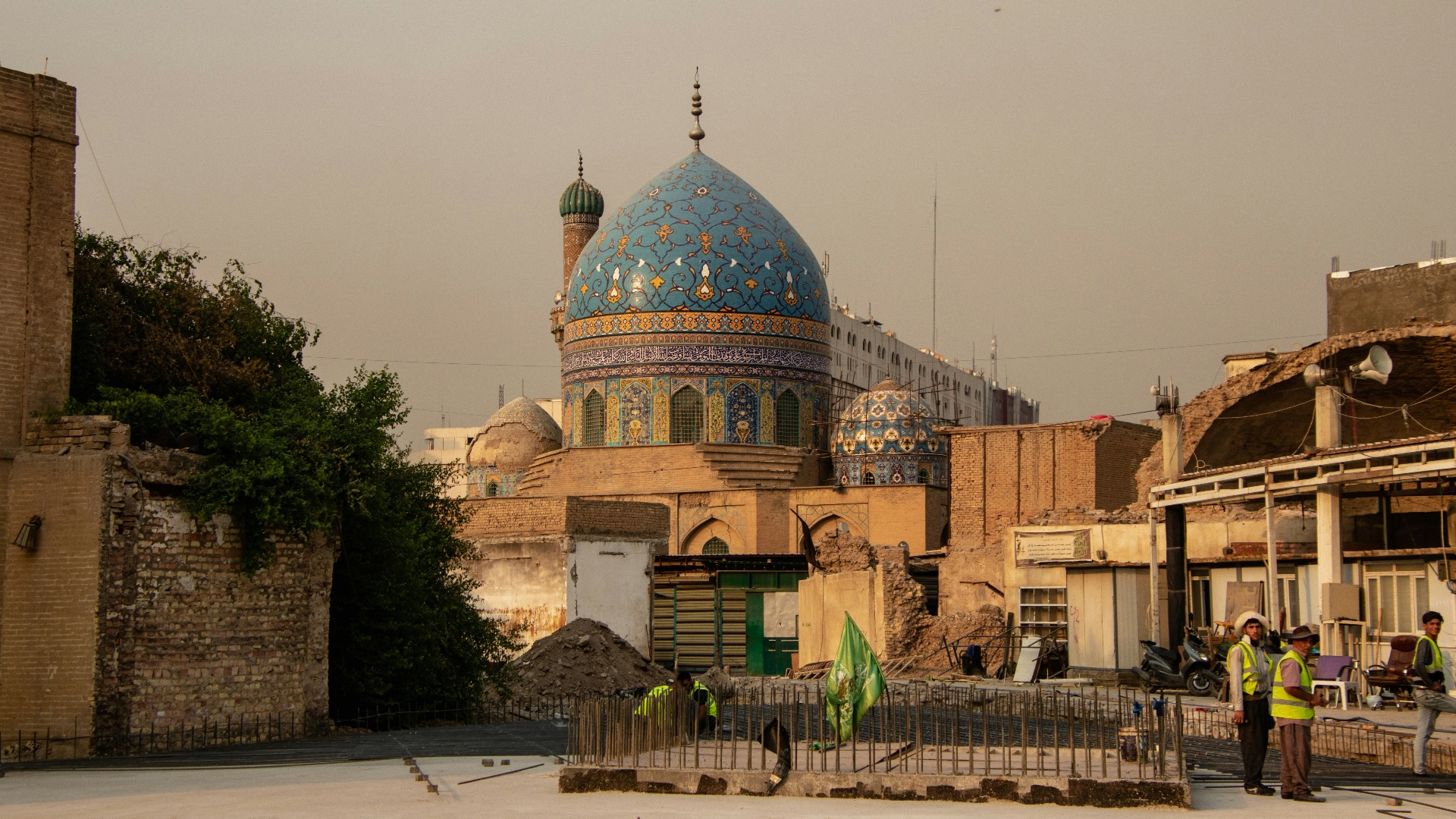A group of people standing in front of a building