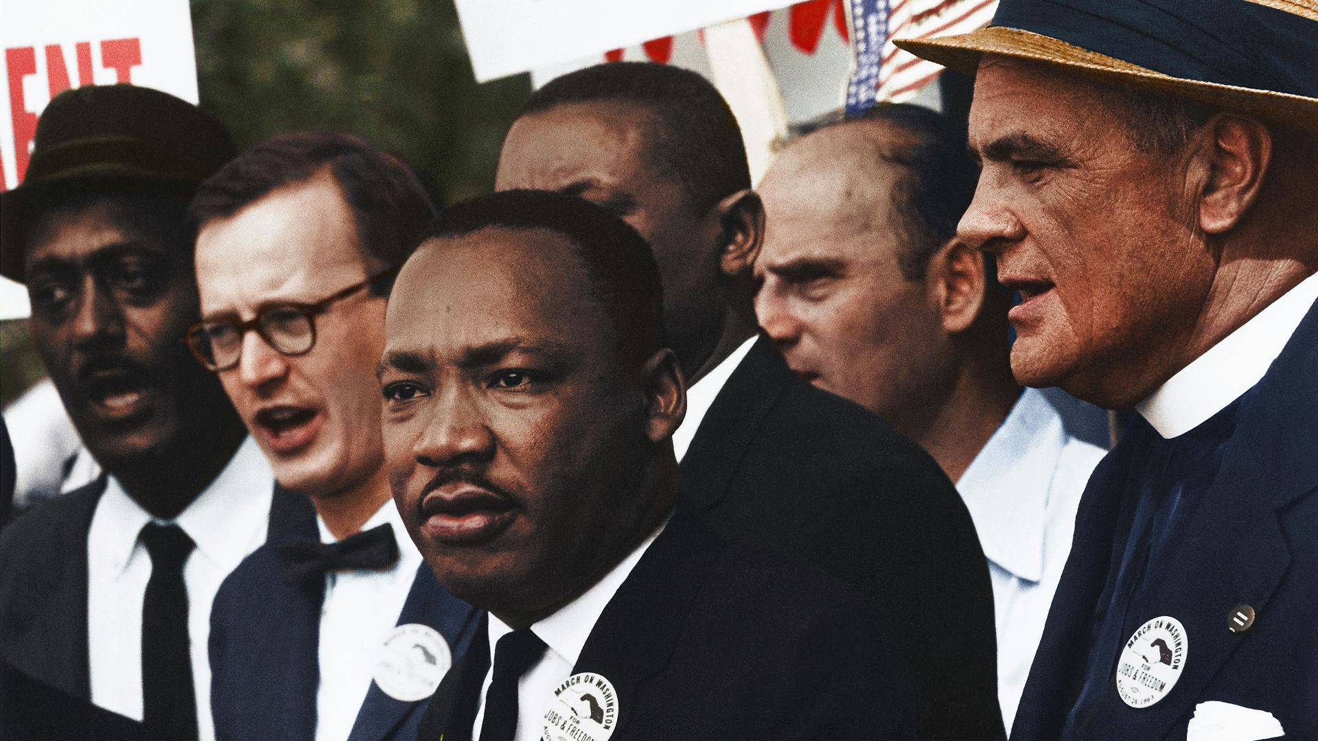 Dr. Martin Luther King, Jr. and Mathew Ahmann in a crowd of demonstrators at the March on Washington