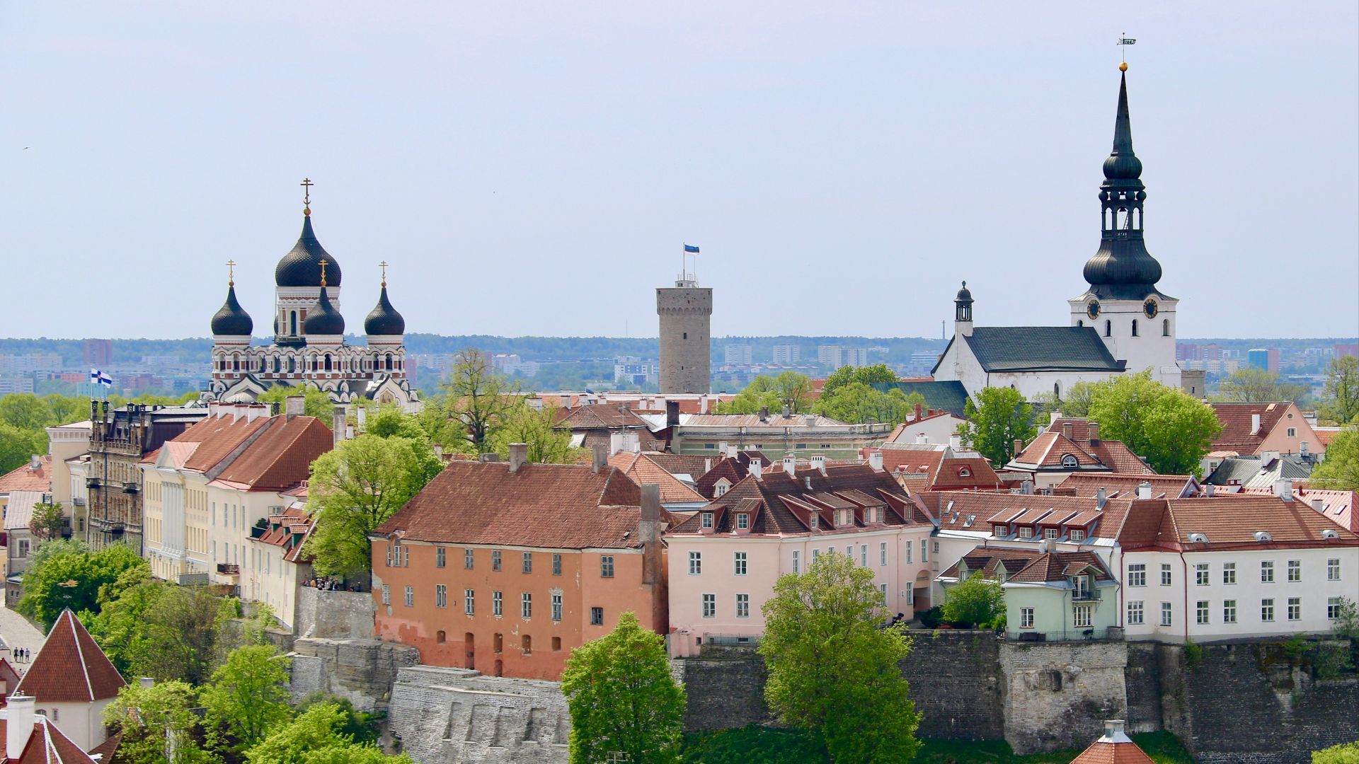 a view of a city from a hill