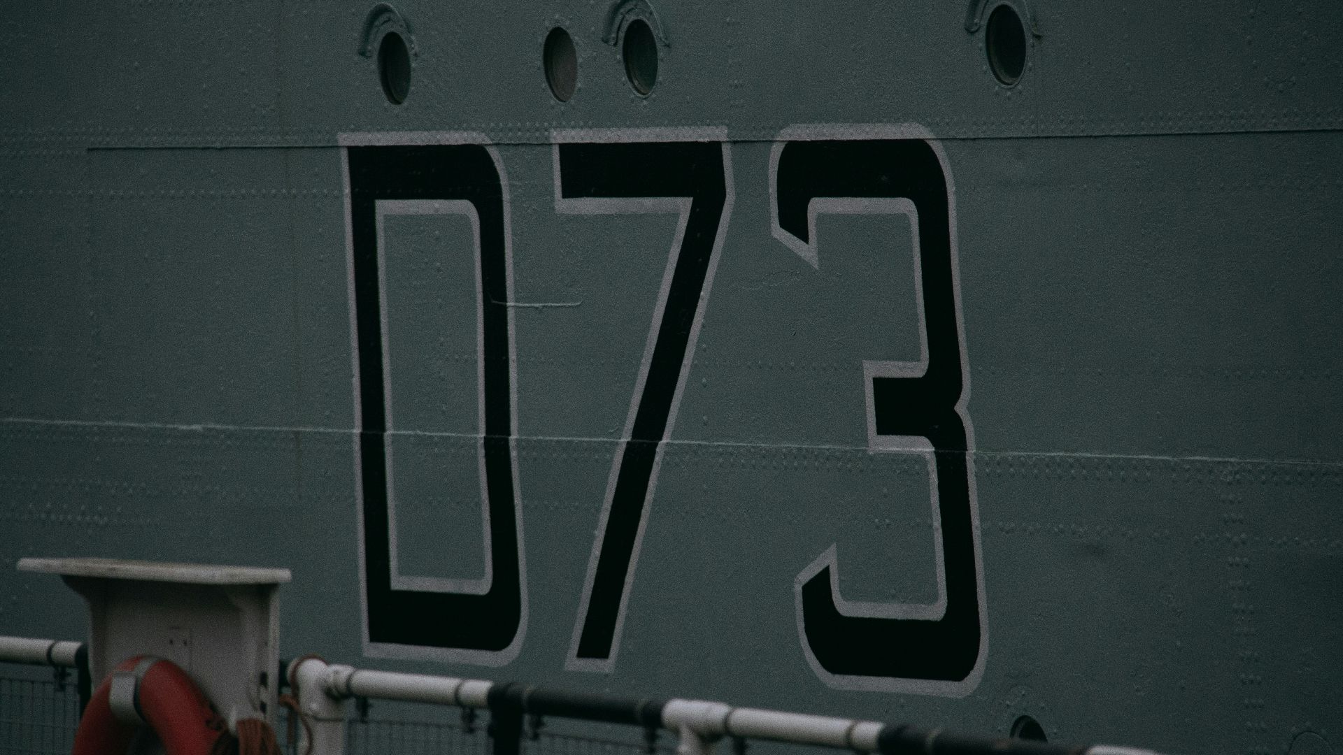 a large ship with the number 37 on it's side