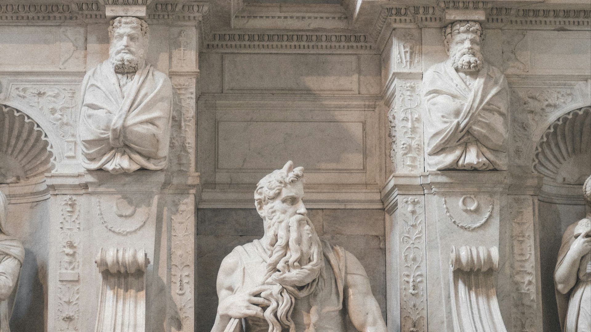 man and woman statue during daytime