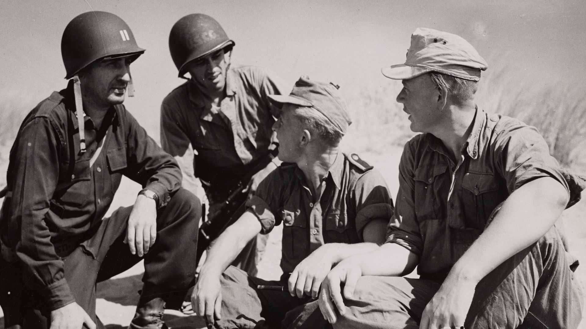 File:Two captured members of the German panzer division that made it hot for the Americans at Salerno tell an American army officer and a Coast Guardsman what the battle looked like from the German side. (51219129190).jpg