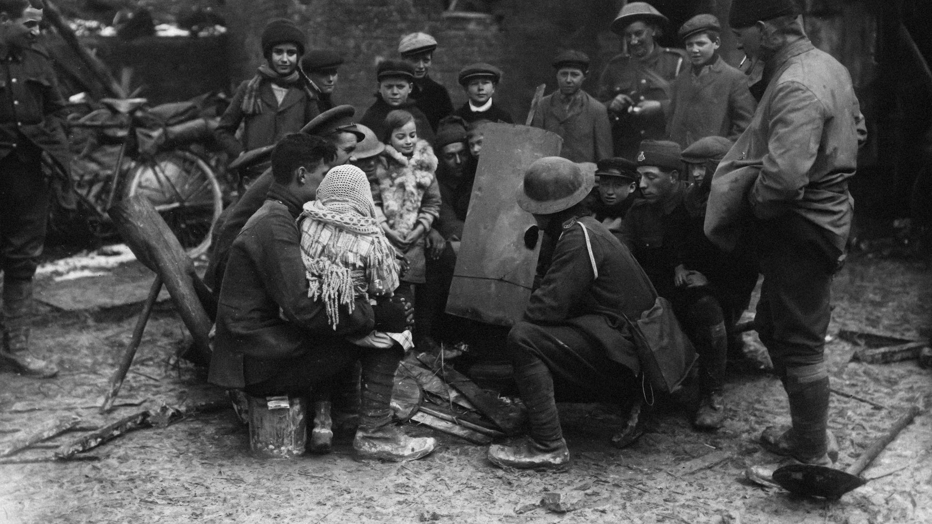 a group of people standing around each other
