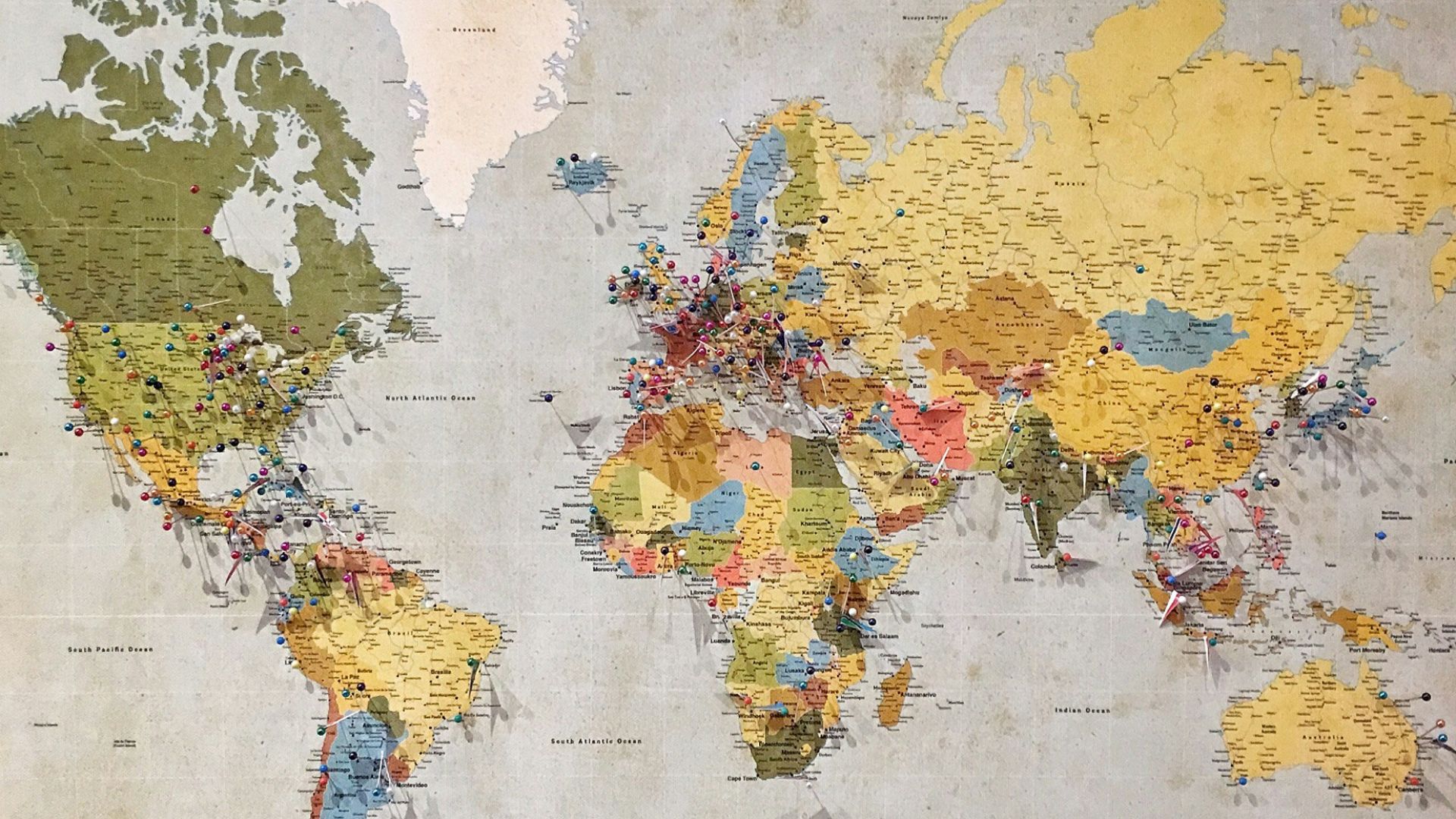 blue, green, and yellow world map