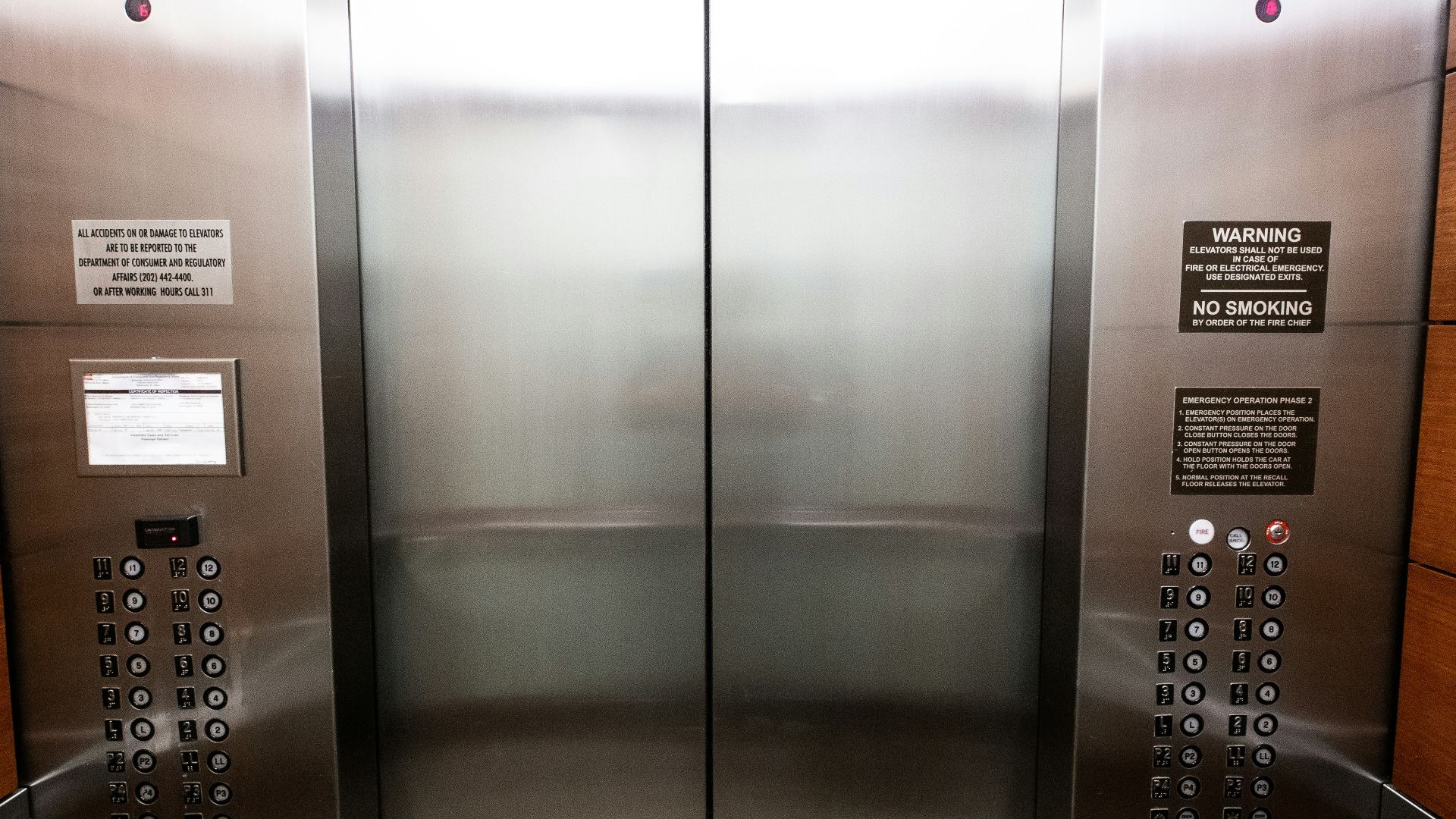 stainless steel elevator door with buttons