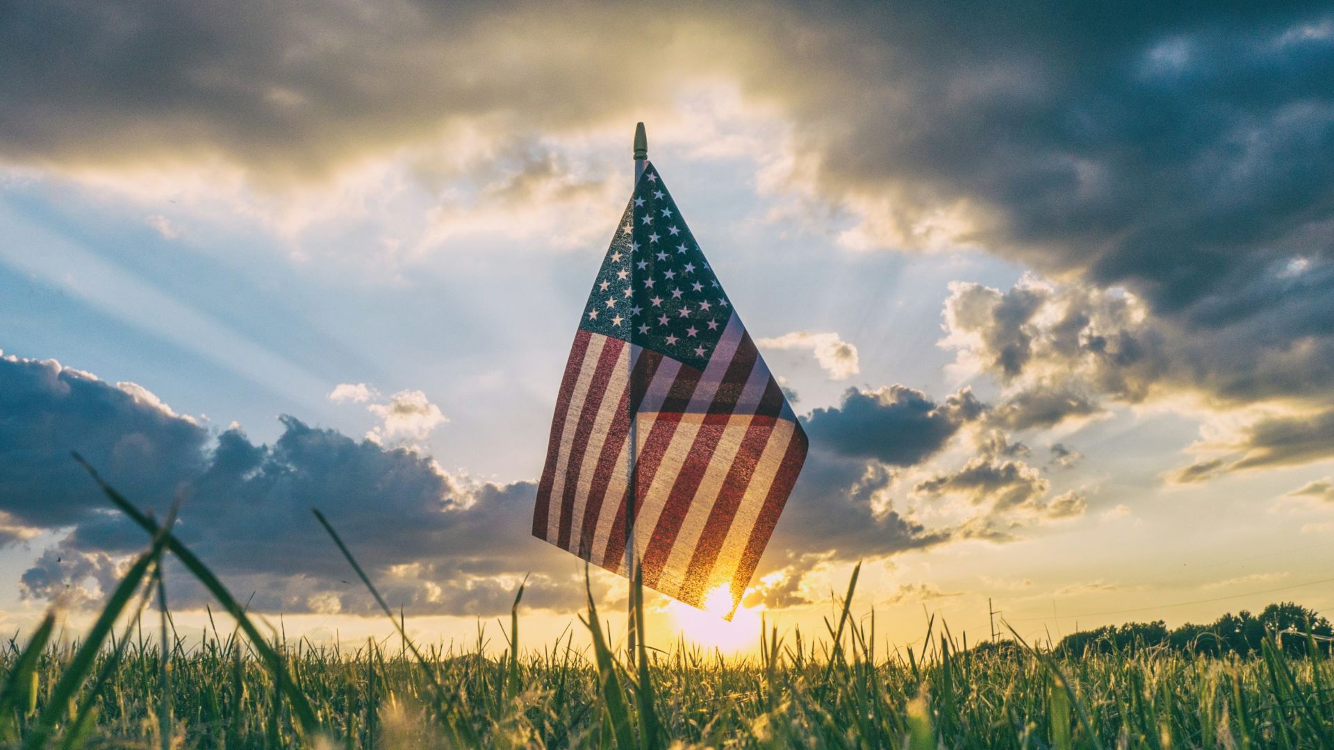 flag of USA on grass field