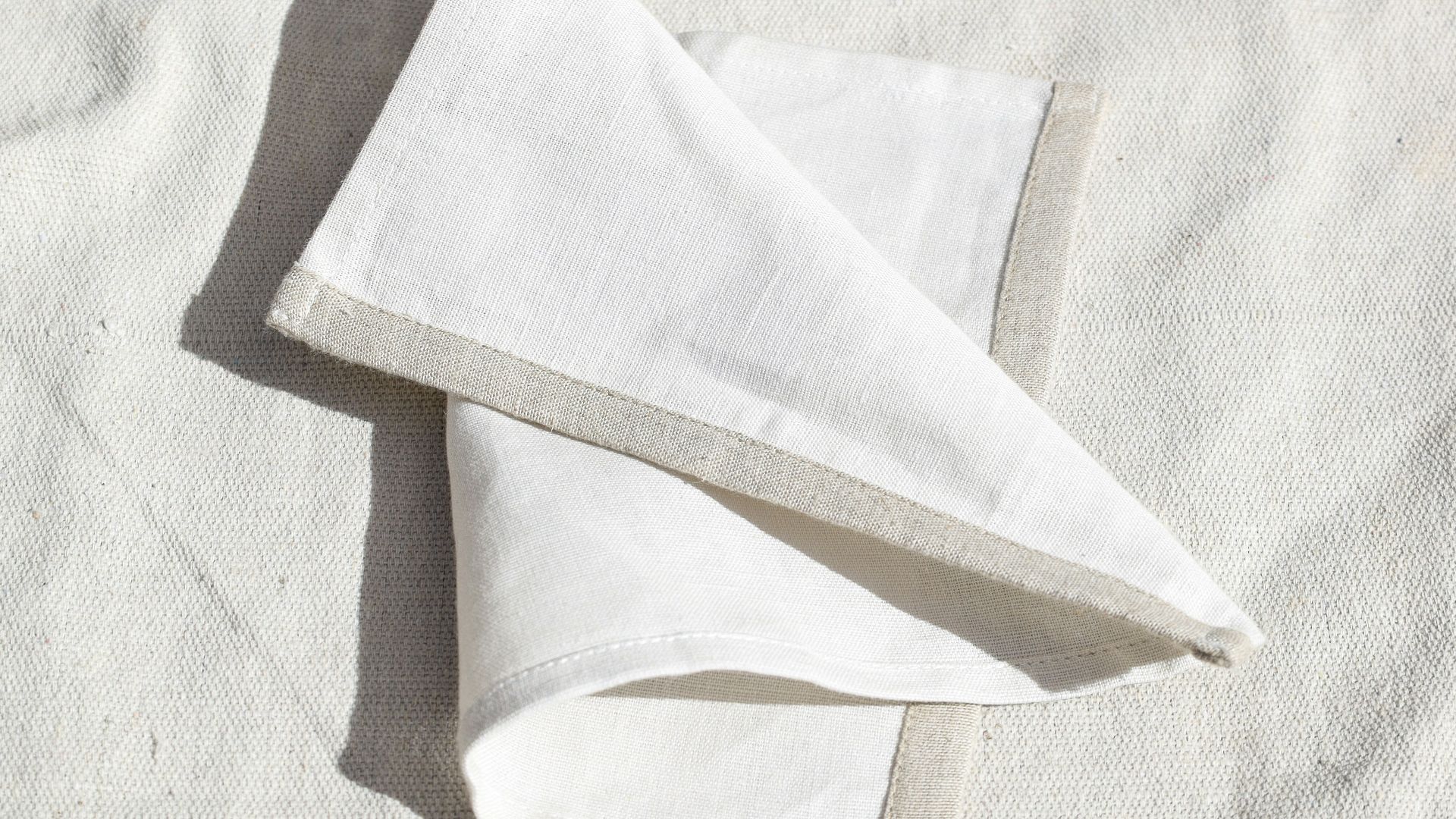 a paper chair on a carpet