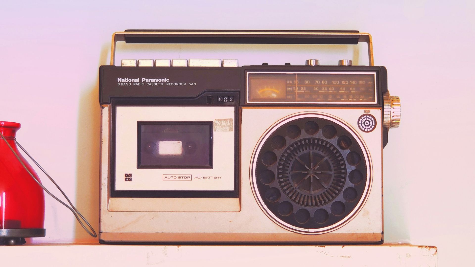 brown and black radio on white table