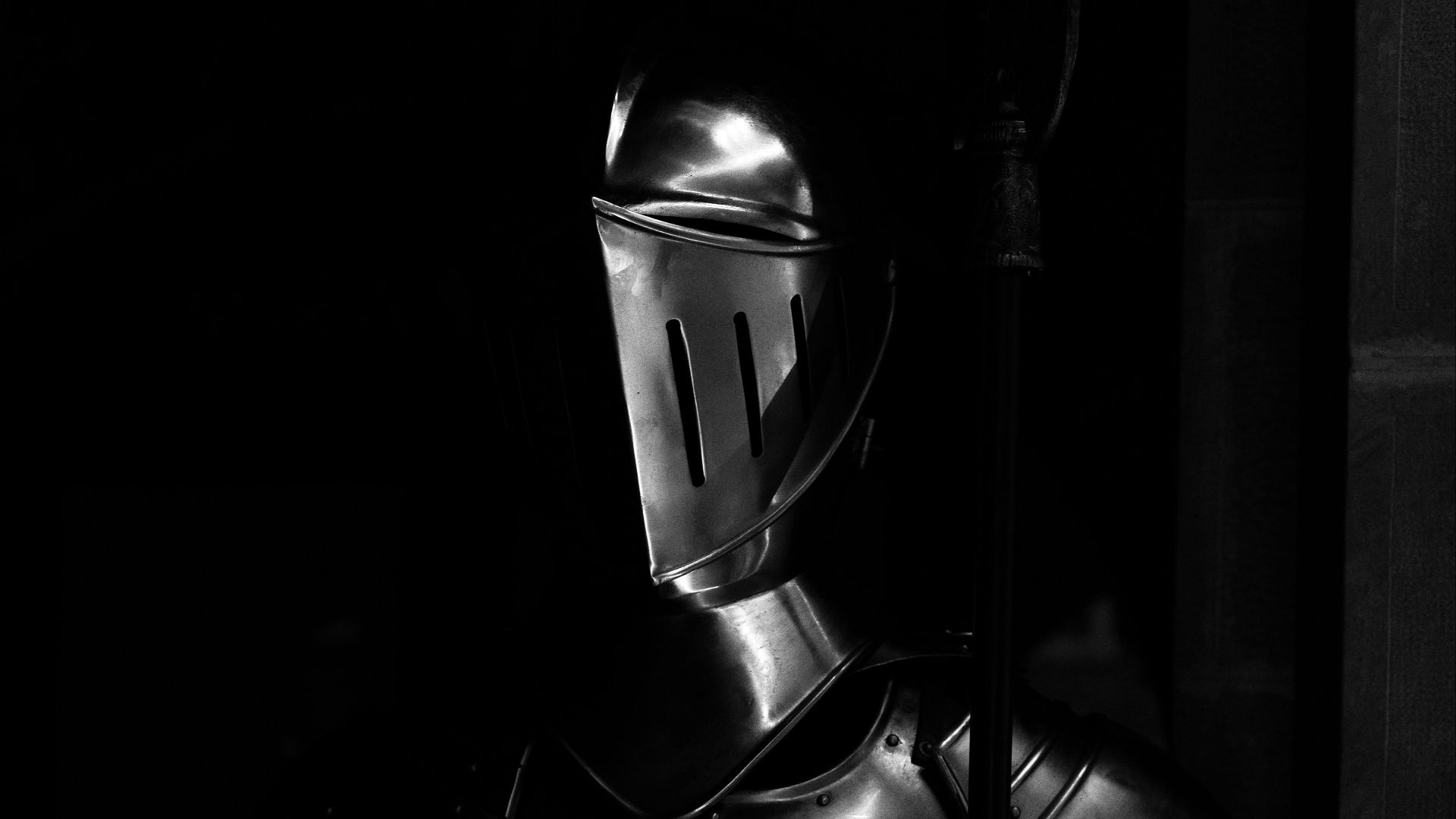 grayscale photography of armor