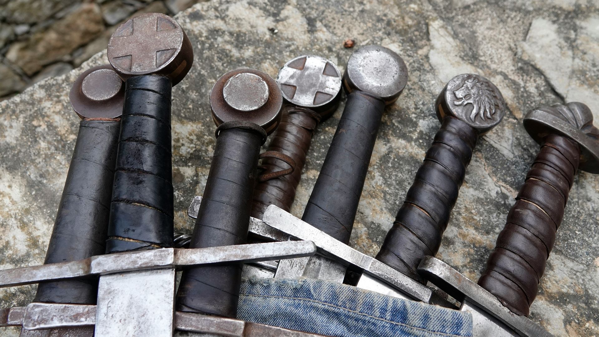 a bunch of different types of tools on a rock