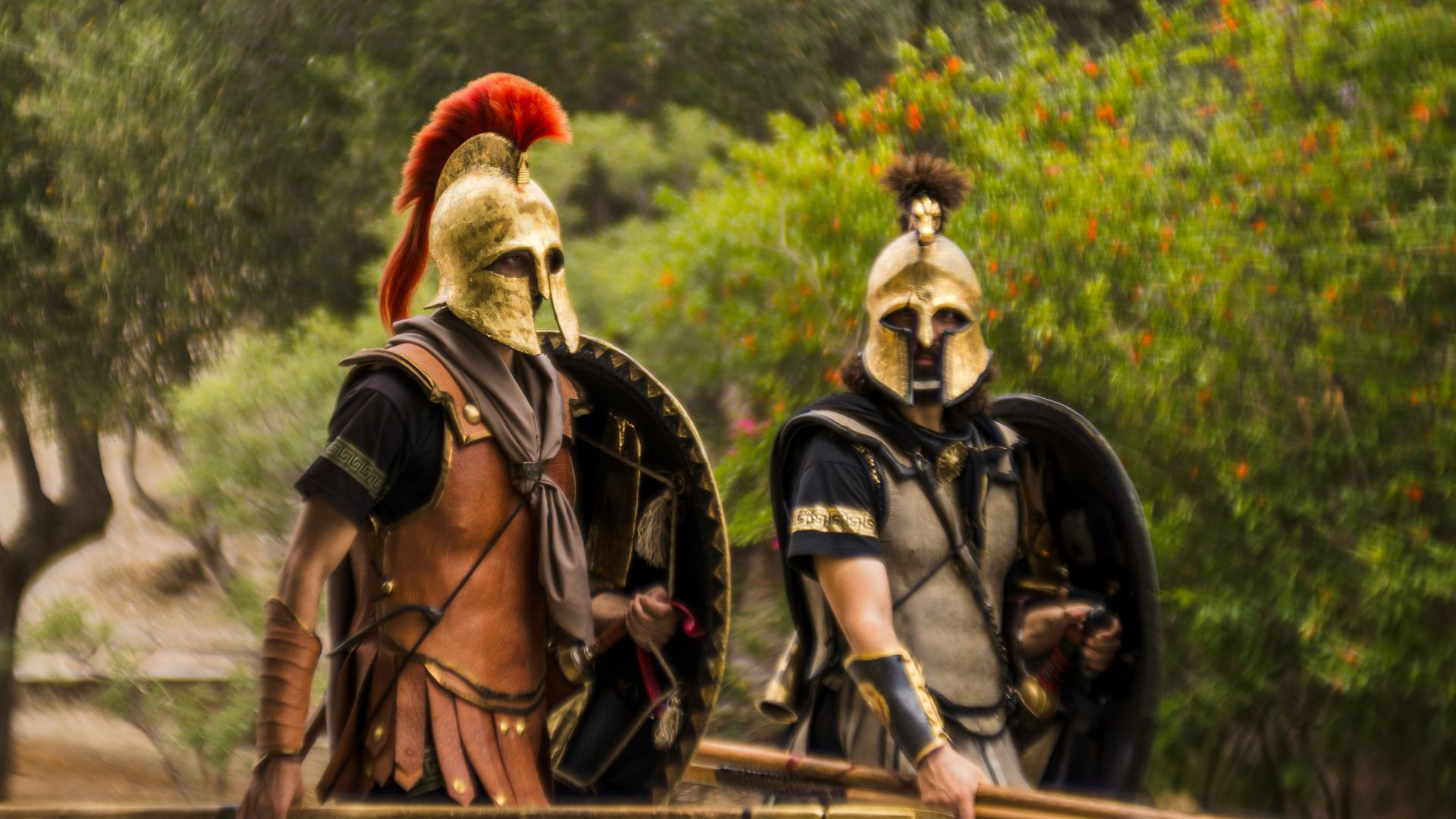 A couple of people that are standing in the street