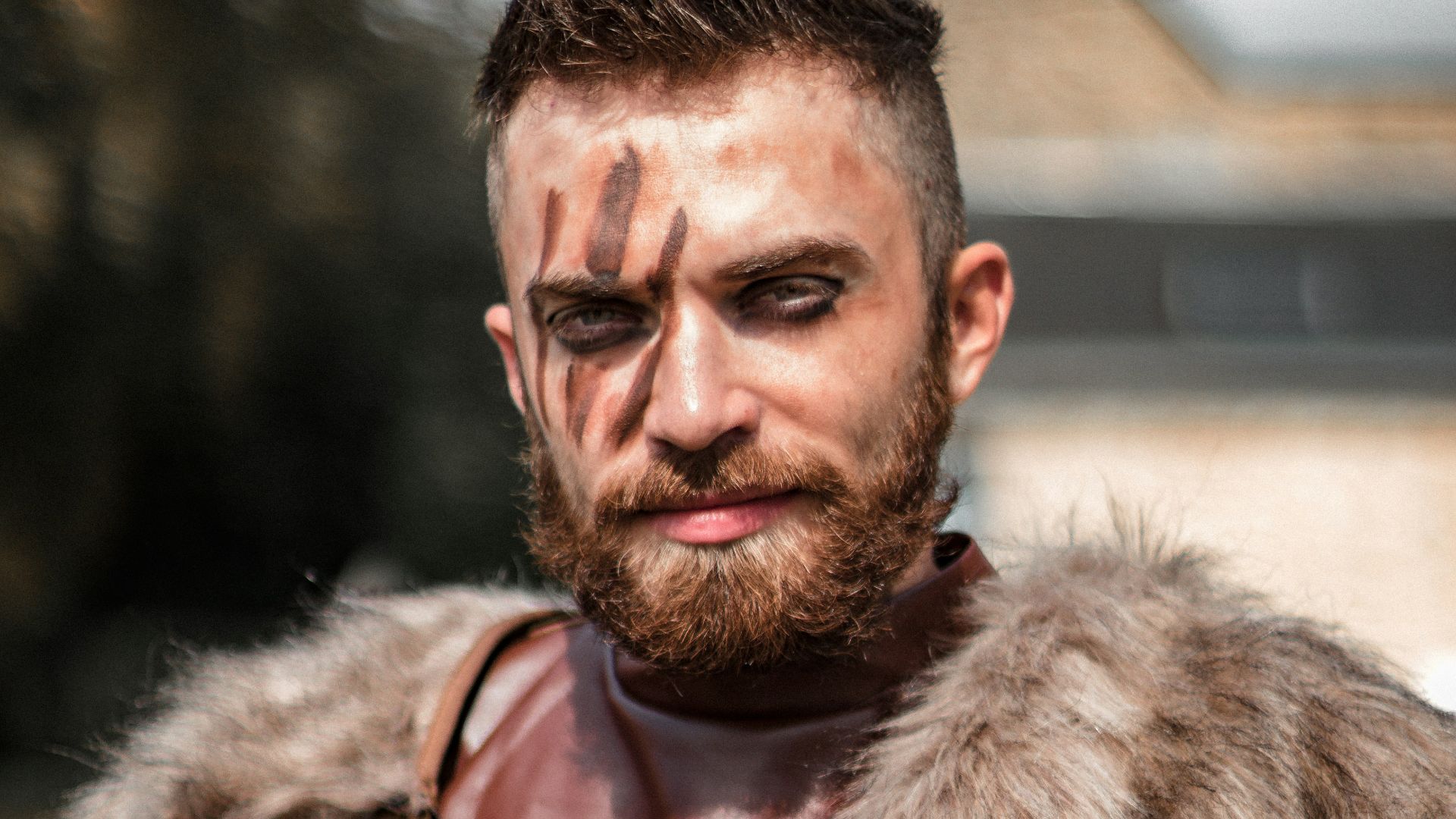 man in brown fur coat