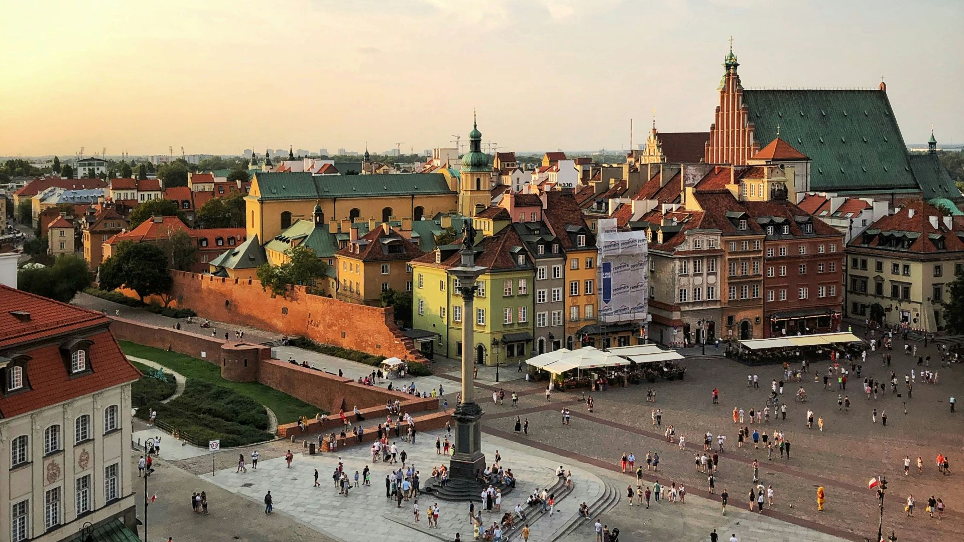 aerial photograph of people walking on town square