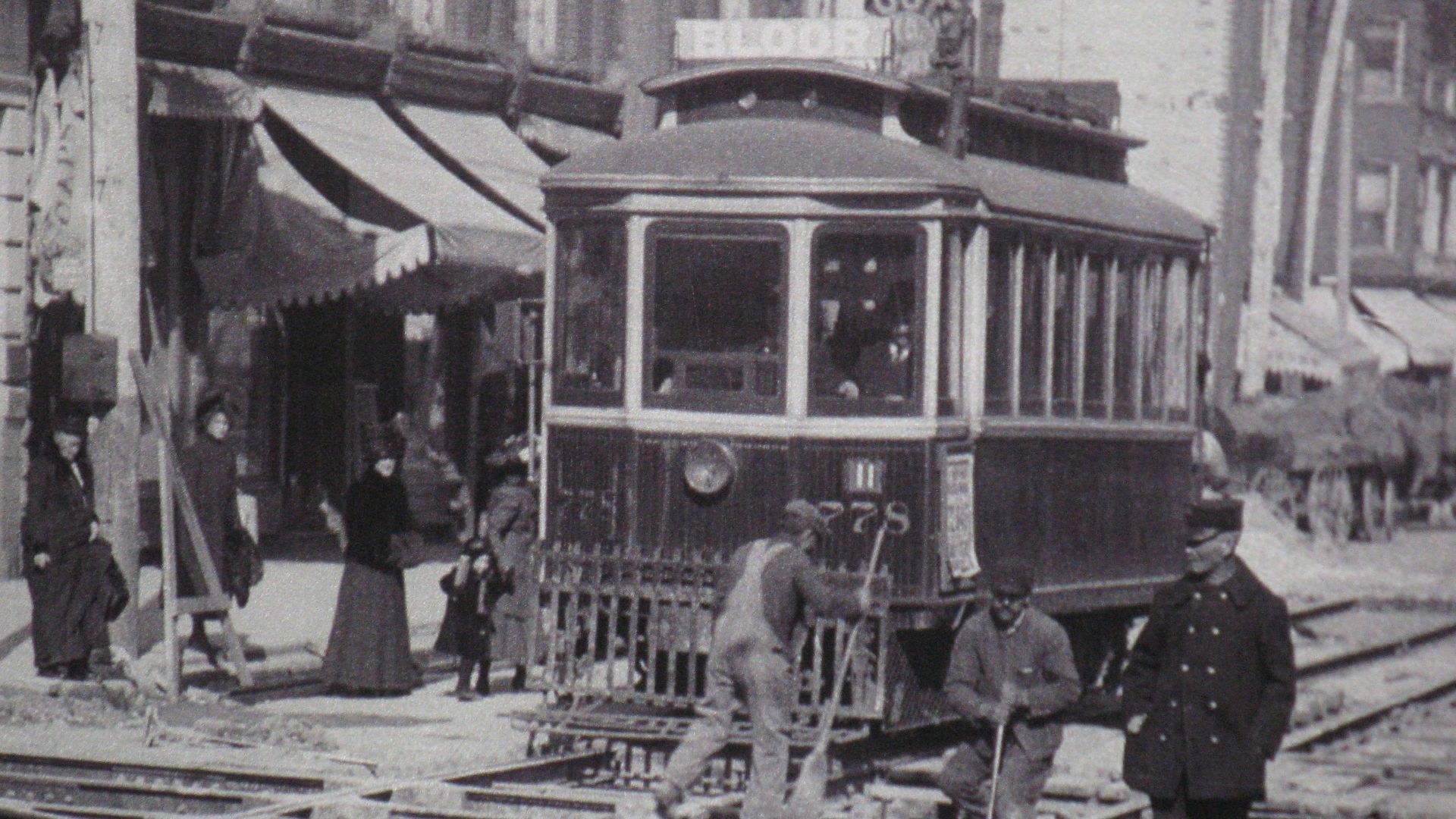 File:Detail of a City of Toronto archives photo of streetcar track maintenance at Bloor and Bathurst -a.jpg