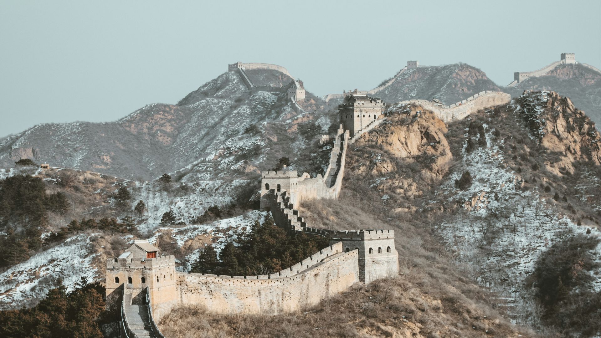 aerial view of gray concrete building on top of mountain during daytime