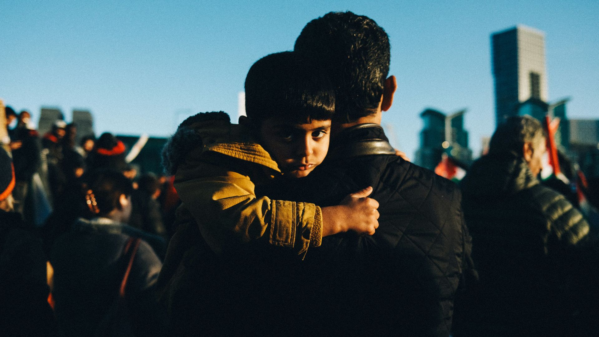 A couple of people that are hugging each other