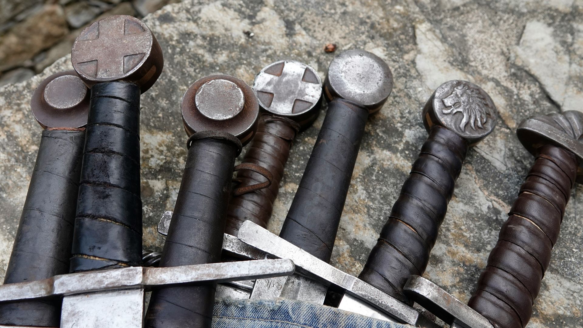 a bunch of different types of tools on a rock