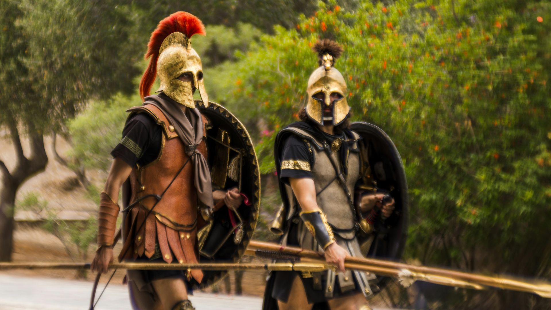 A couple of people that are standing in the street