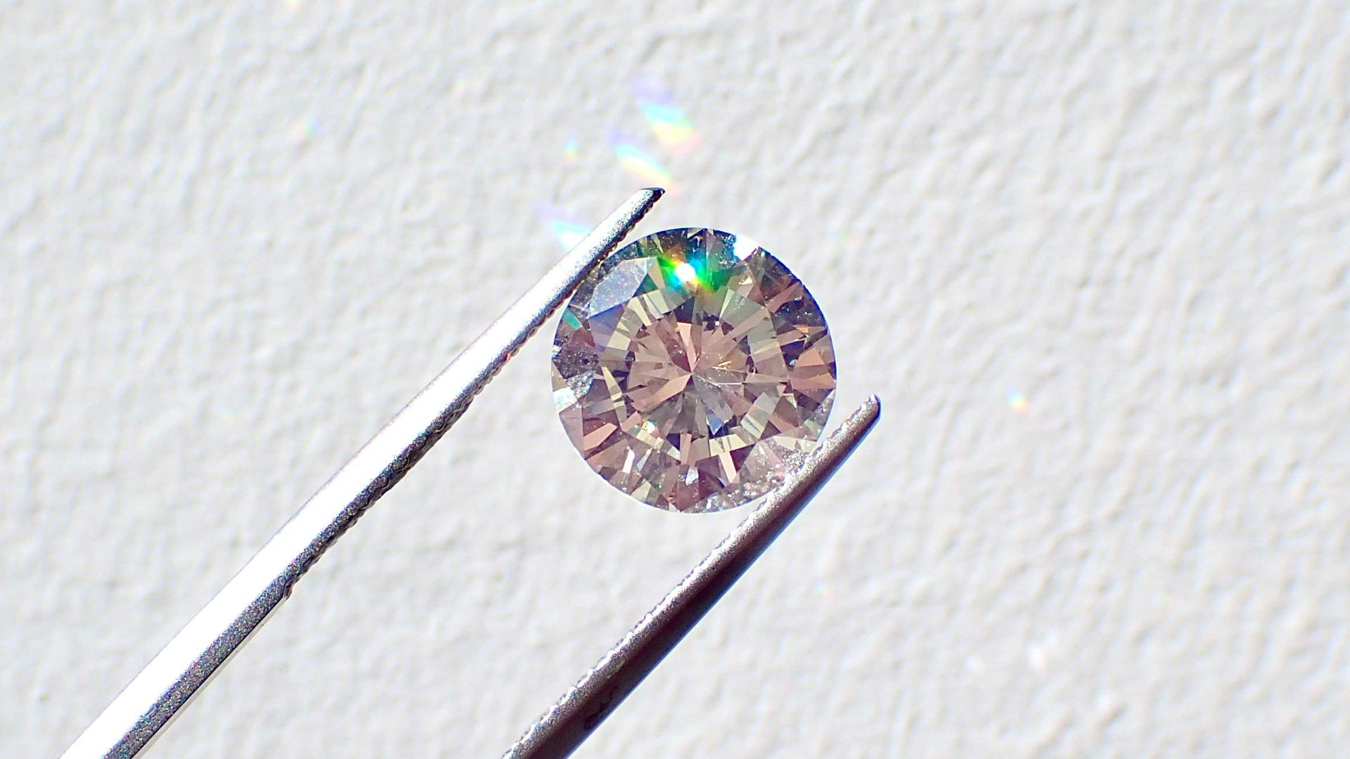 white coated wire on white painted wall