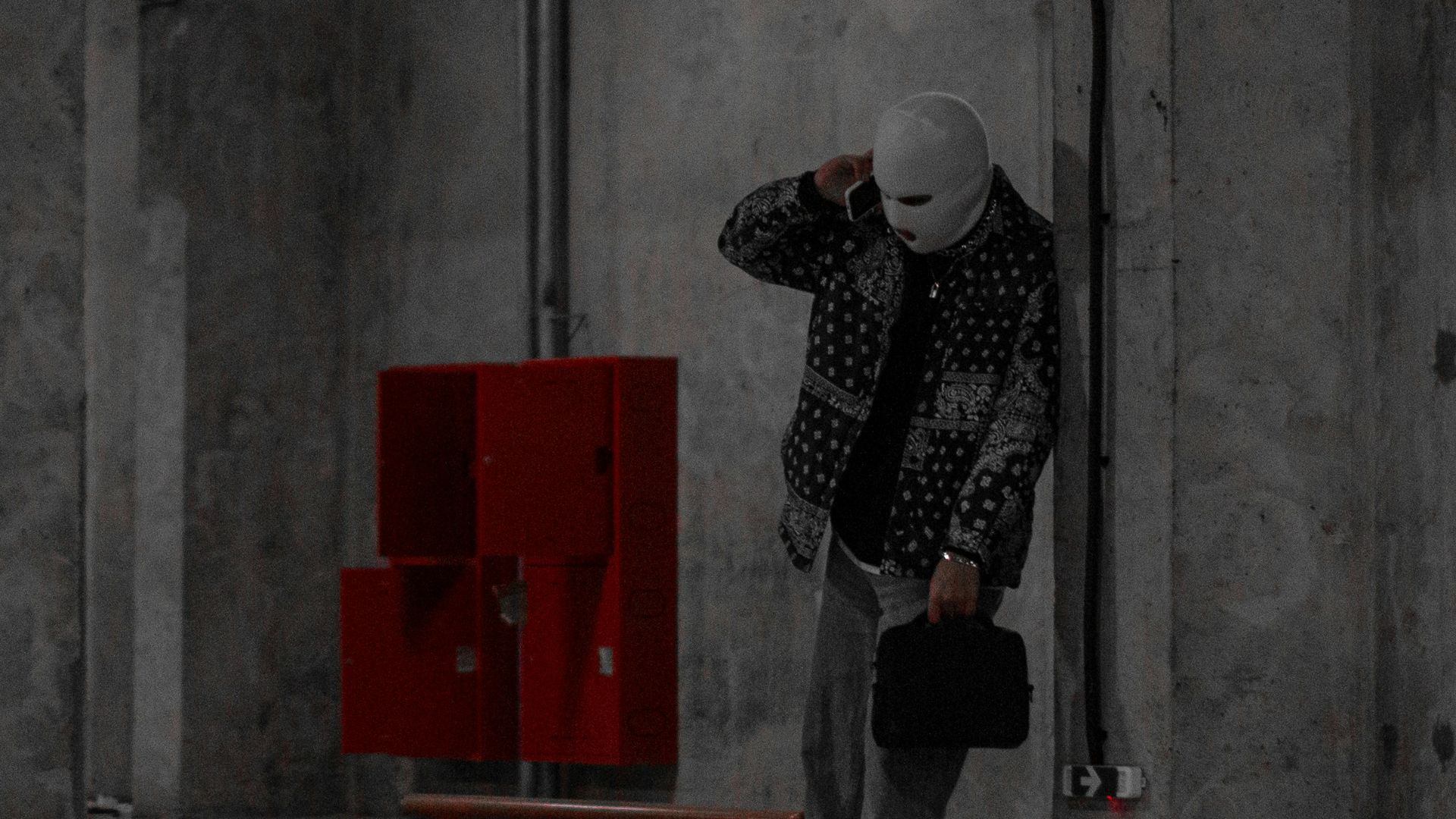 a man standing in a parking lot