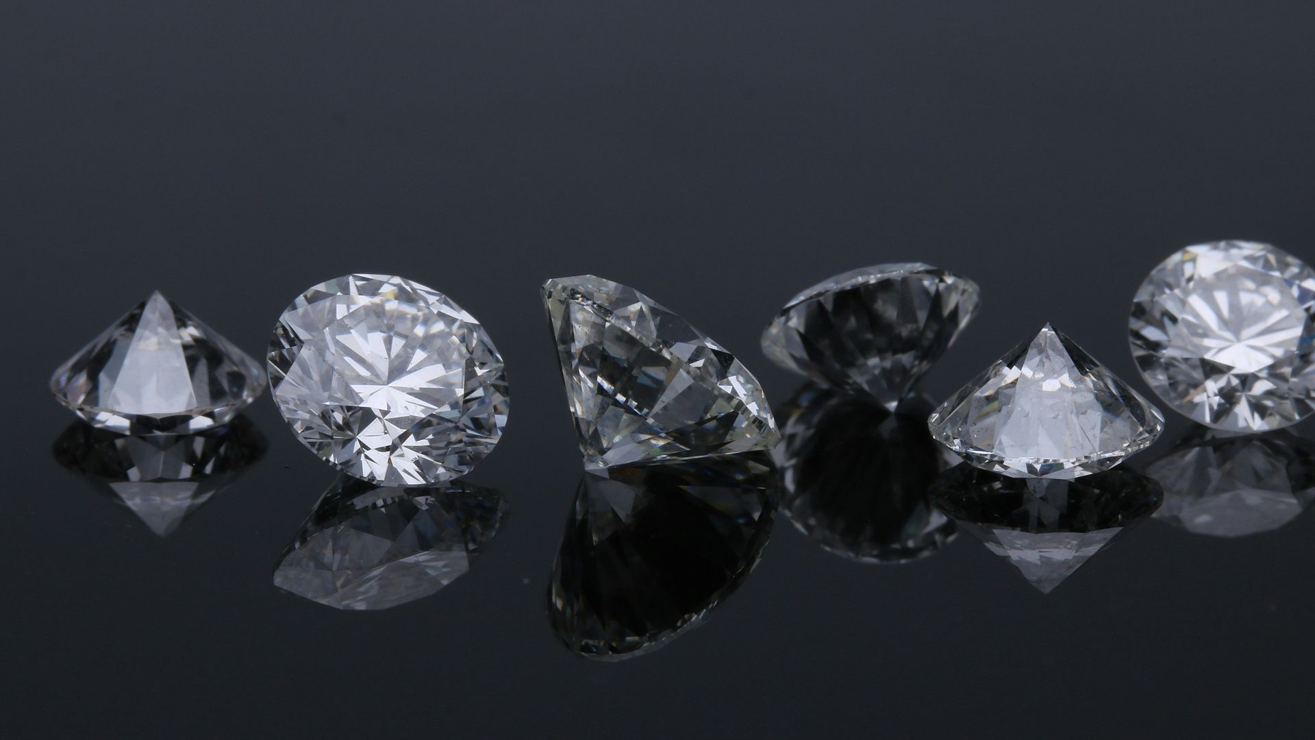 two diamond studded silver rings