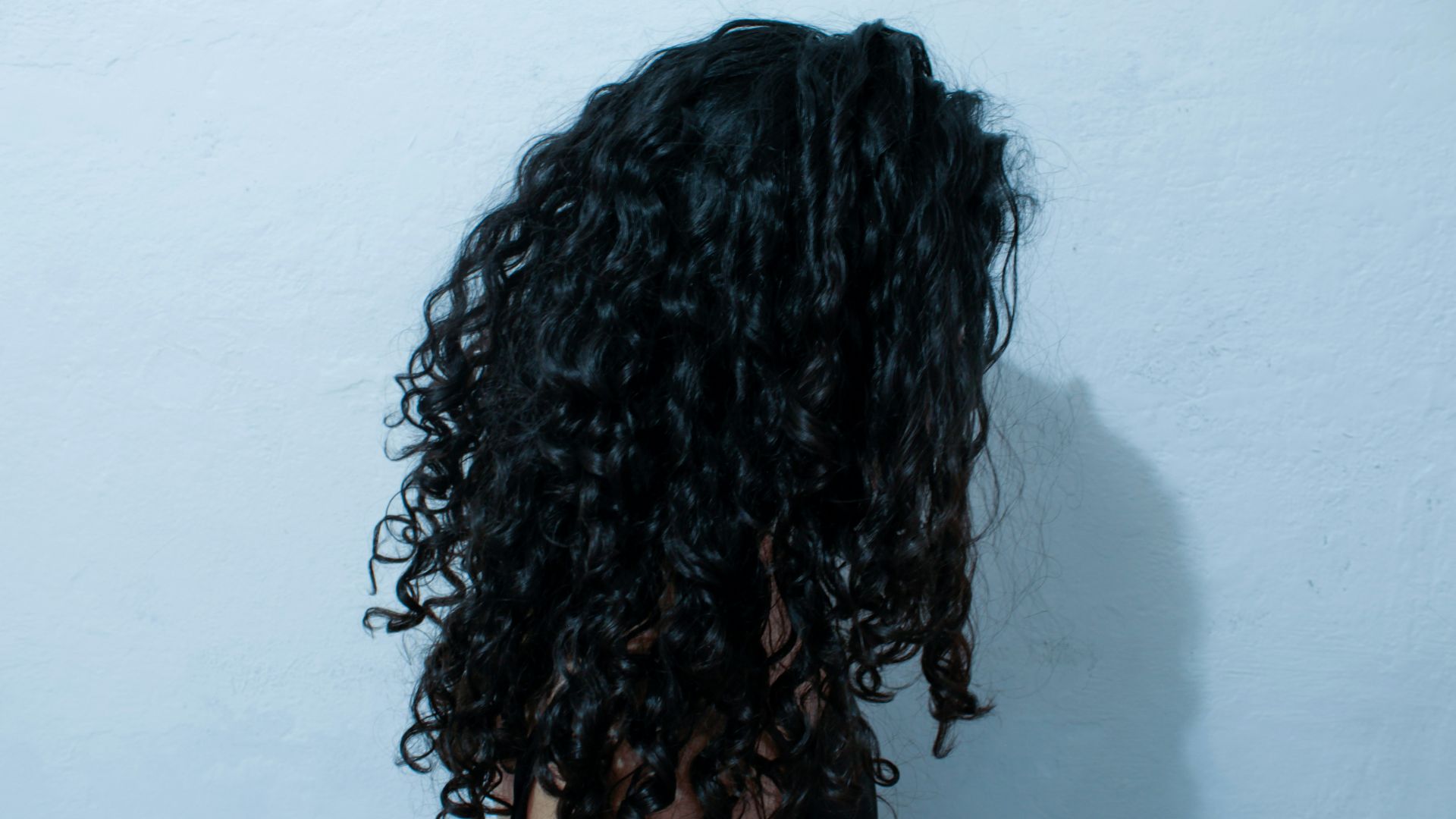 a person with the hair pulled back