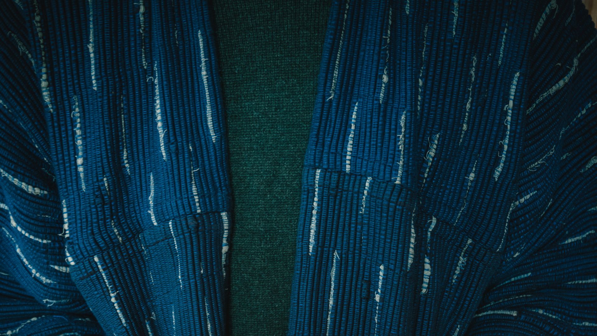 a person holding a bowl of food in their hands