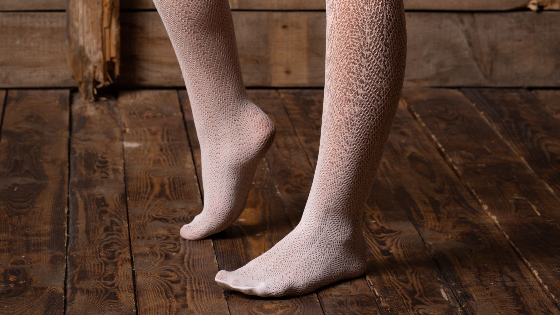 File:Knitted folklike sheer to waist net tights with ajour pattern in the colour white – worn under red girdle knickers.jpg