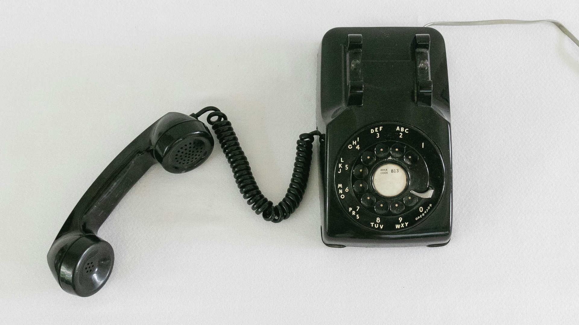black and silver rotary phone