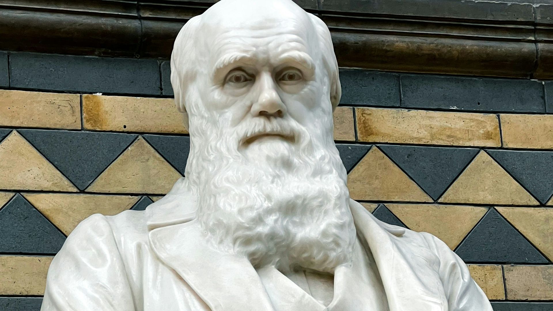 a statue of a man with a white beard