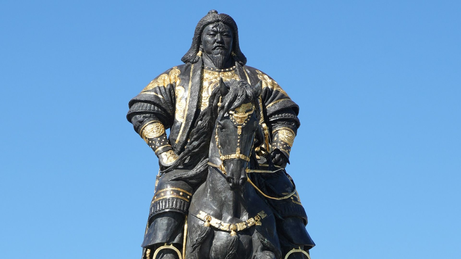 Monumental statue of a historical figure on horseback.