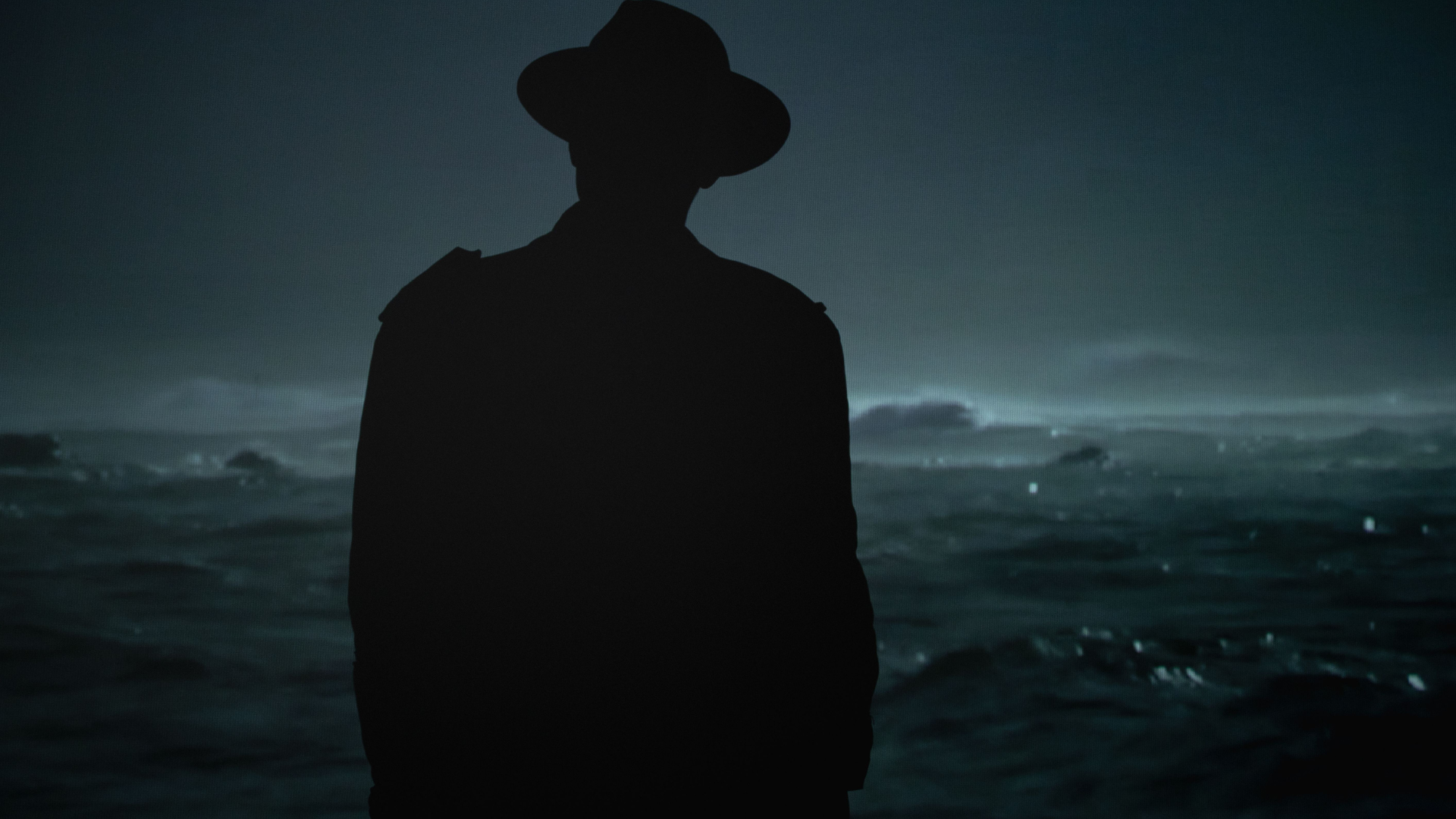 mystery-man-by-dark-ocean-thumb-rss.png