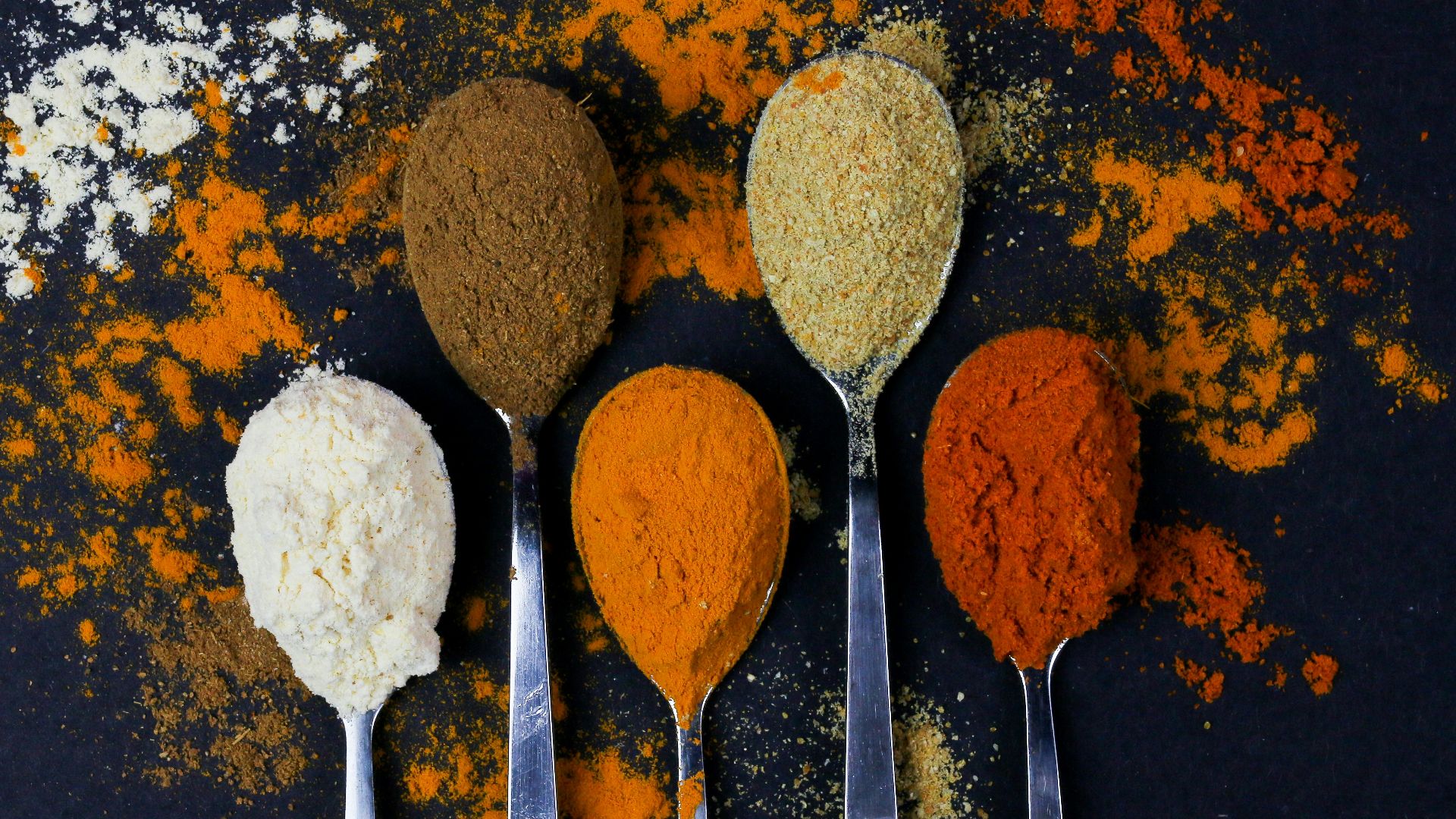 brown powder on silver spoon