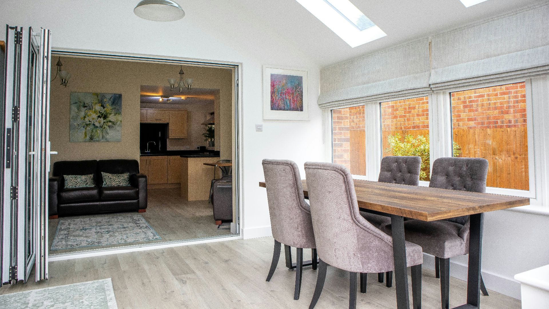 Elegant dining room and view of the kitchen.