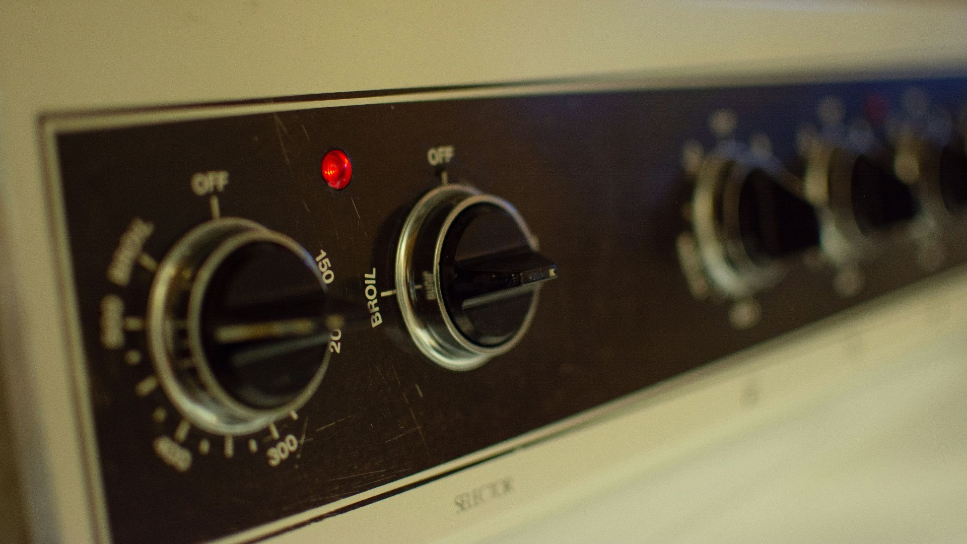 a close up view of the knobs on a stove