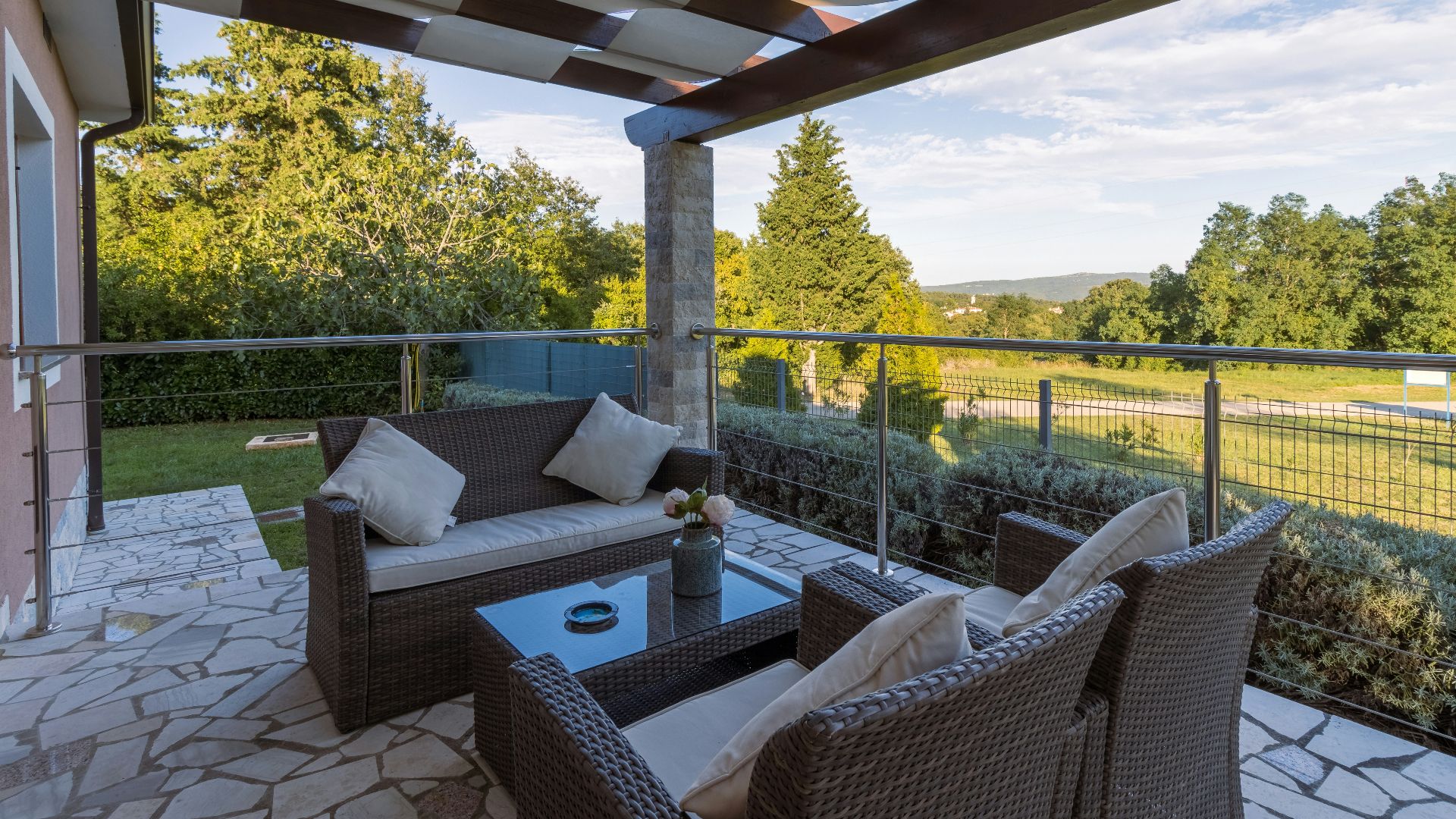 brown wicker chairs and table