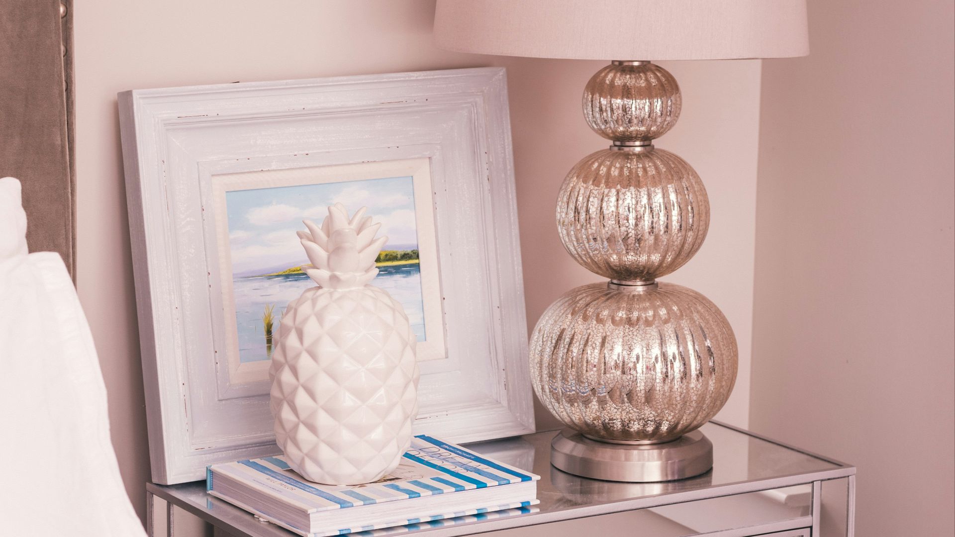 white and silver-colored table lamp