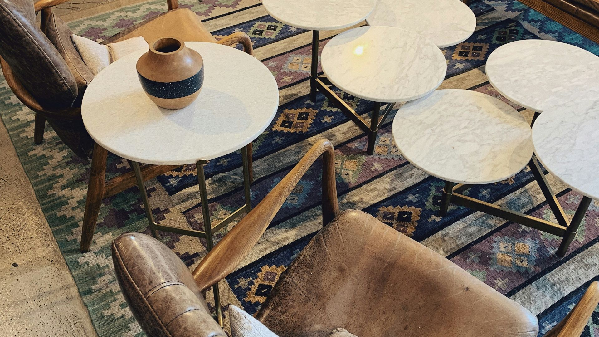 brown wooden round table with chairs