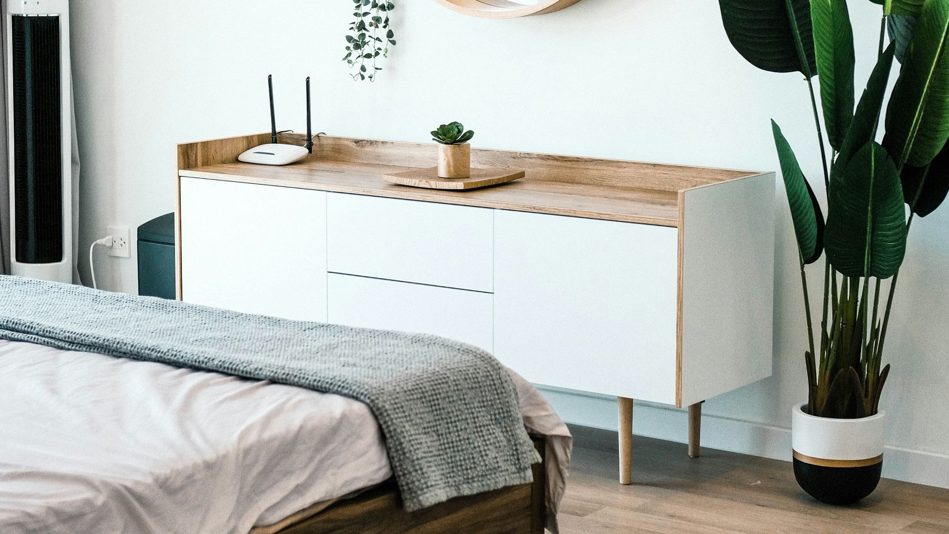 white wooden dresser with mirror
