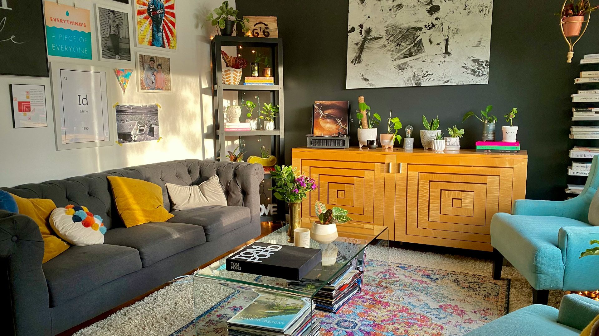 brown wooden cabinet near gray couch