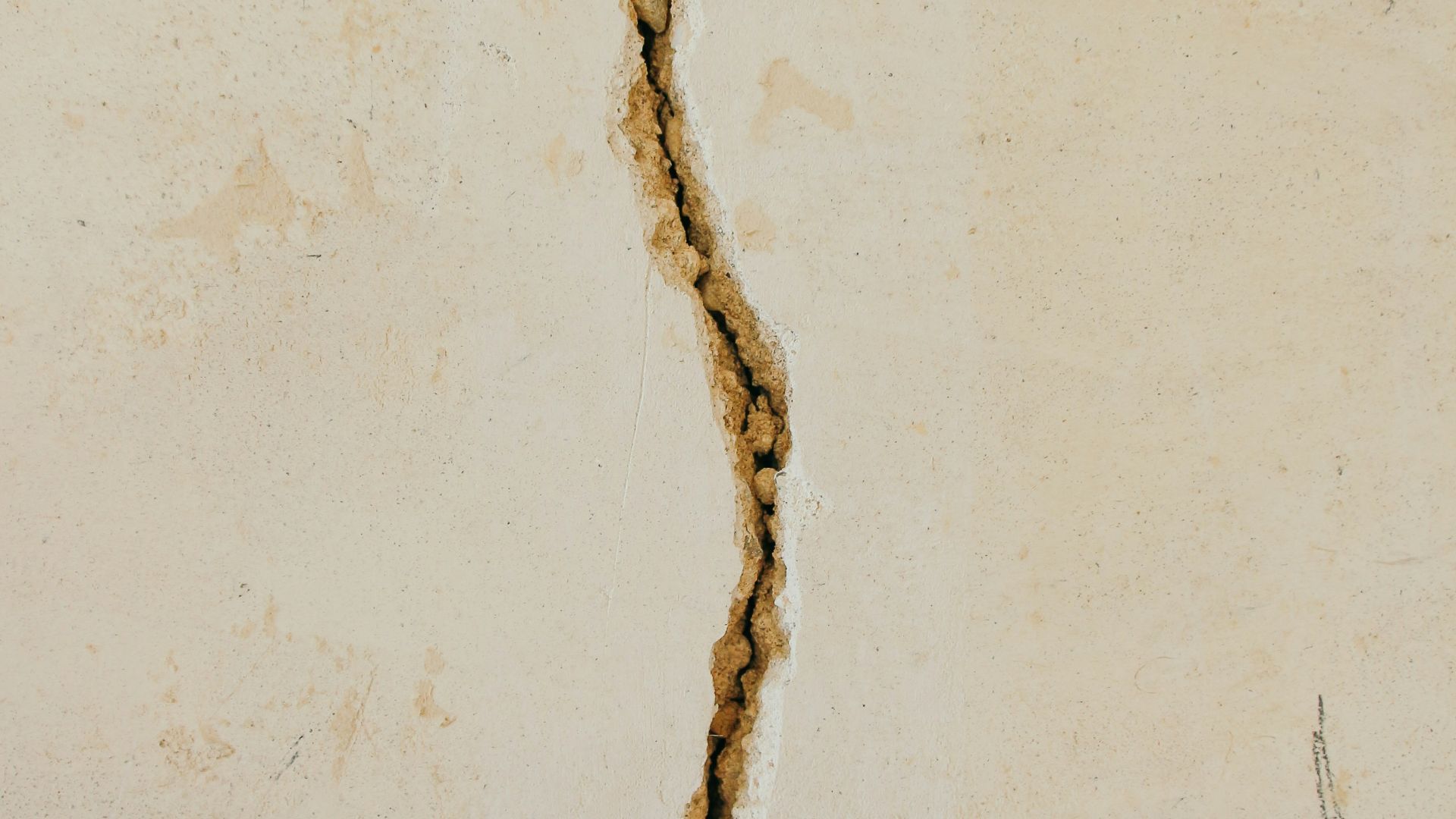 crack on white concrete surface