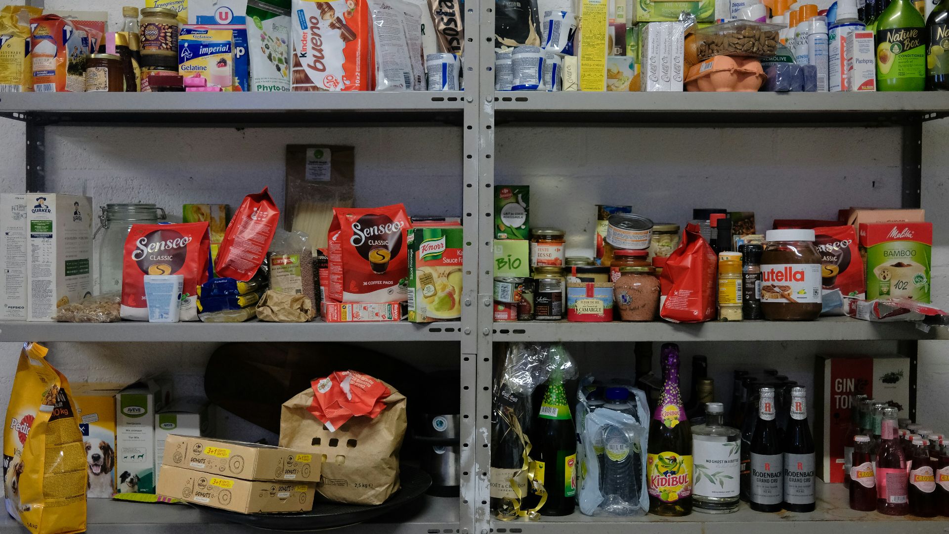 a shelf filled with lots of food items