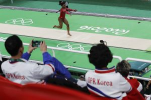 Simone_Biles_training_at_the_2016_Summer_Olympics_in_Rio_de_Janeiro_watched_by_North_Koreans-300x200.jpg